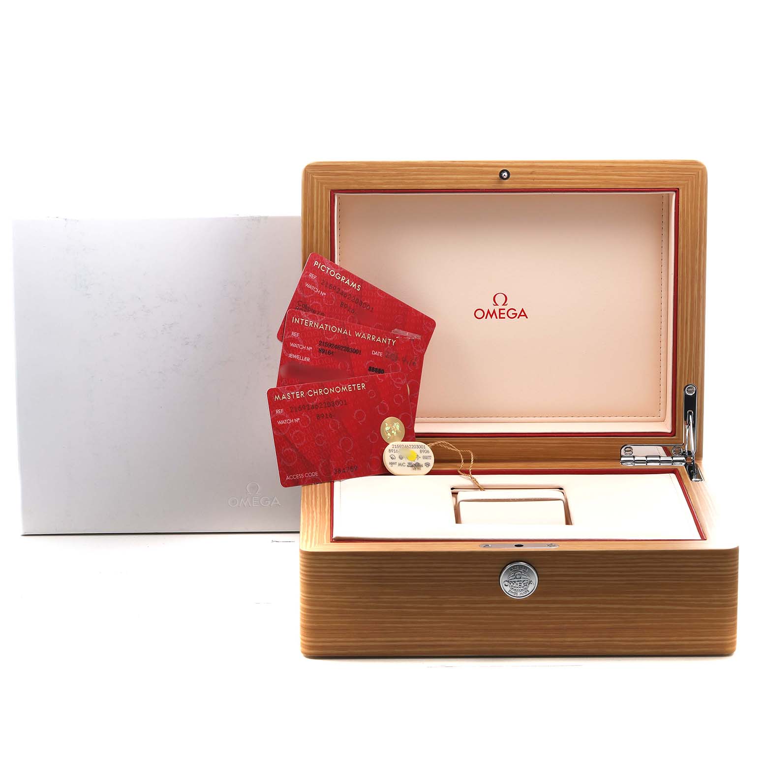 The image shows an Omega Planet Ocean 215.92.46.22.03.001 Men's Ceramic Blue Dial watch box with warranty cards and accessories visible from a front angle.