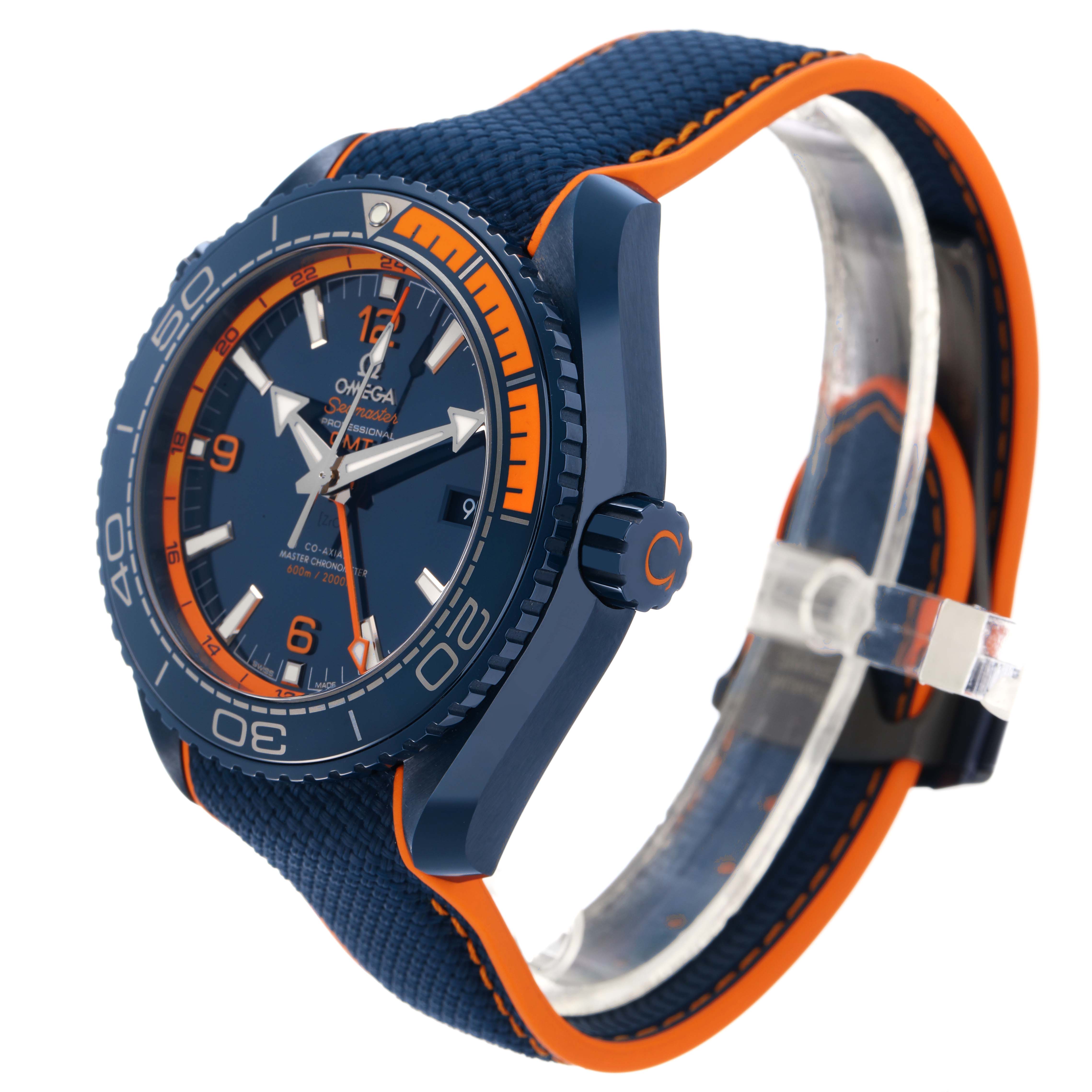 The image shows an Omega Planet Ocean 215.92.46.22.03.001 Men's Ceramic Blue Dial watch at a three-quarter angle, highlighting the bezel, dial, crown, and strap details.