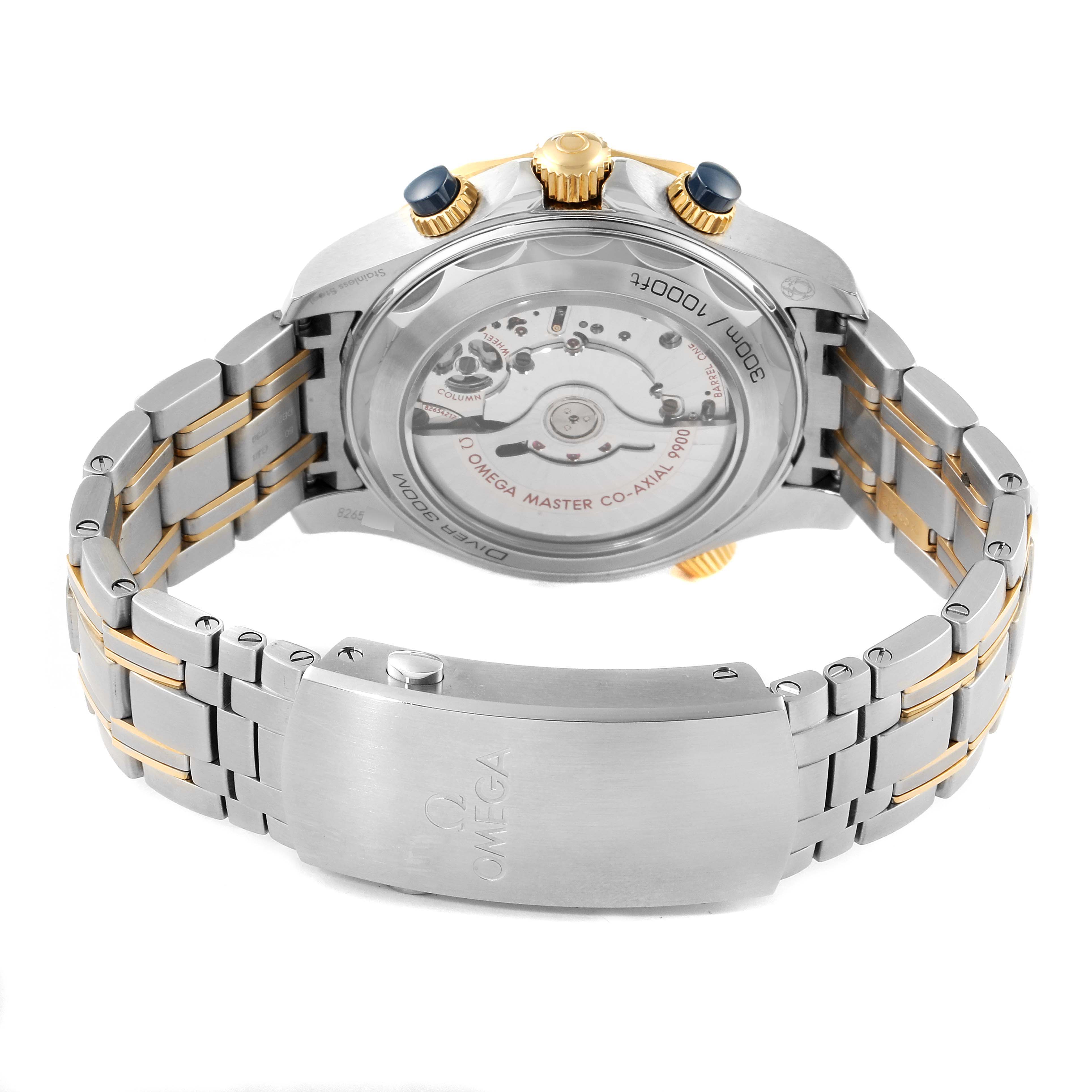 An Omega Seamaster 210.20.44.51.03.001 Men
s Steel and Gold (two tone) Blue Dial 210.20.44.51.03.001 Men
s Steel and Gold (two tone) Blue Dial watch is shown from the back, highlighting its transparent case back, bracelet links, and clasp.