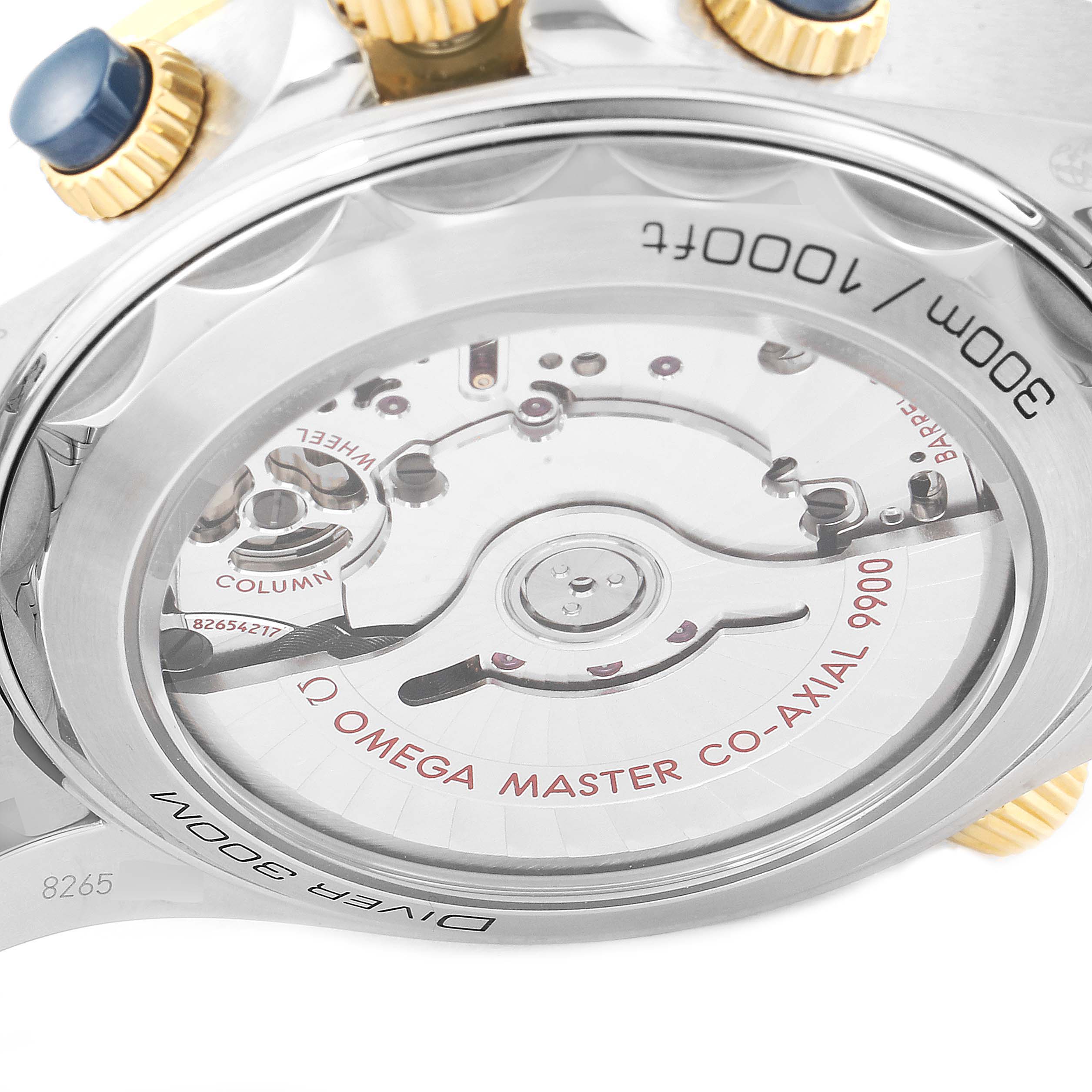 The image shows the back case of an Omega Seamaster 210.20.44.51.03.001 Men
s Steel and Gold (two tone) Blue Dial 210.20.44.51.03.001 Men
s Steel and Gold (two tone) Blue Dial watch, displaying its movement mechanism and text detailing water resistance and model.