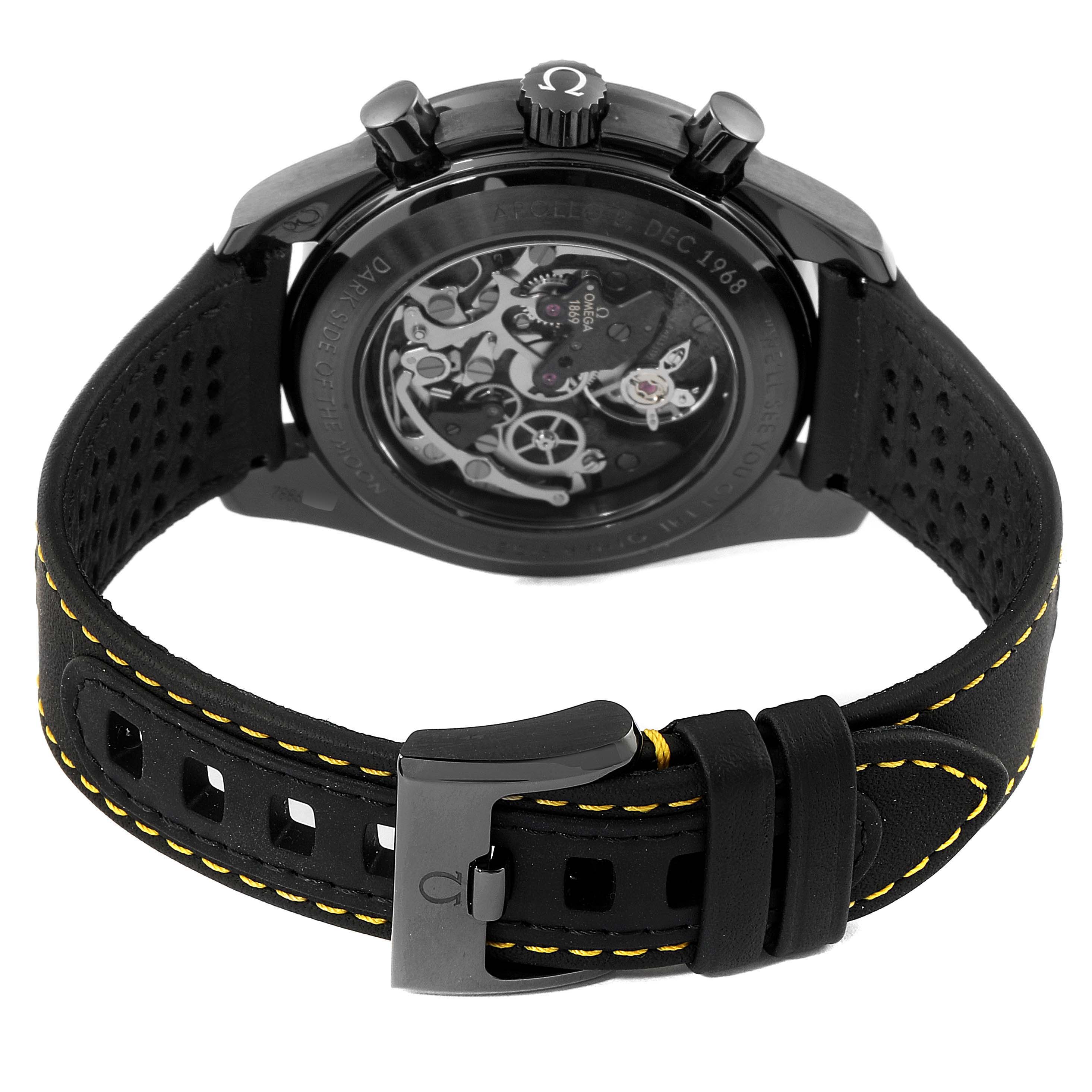 This image shows the back view of an Omega Speedmaster 311.92.44.30.01.001 Men's Titanium Black Dial 311.92.44.30.01.001 Men's Titanium Black Dial watch, highlighting the movement mechanism and the strap buckle.