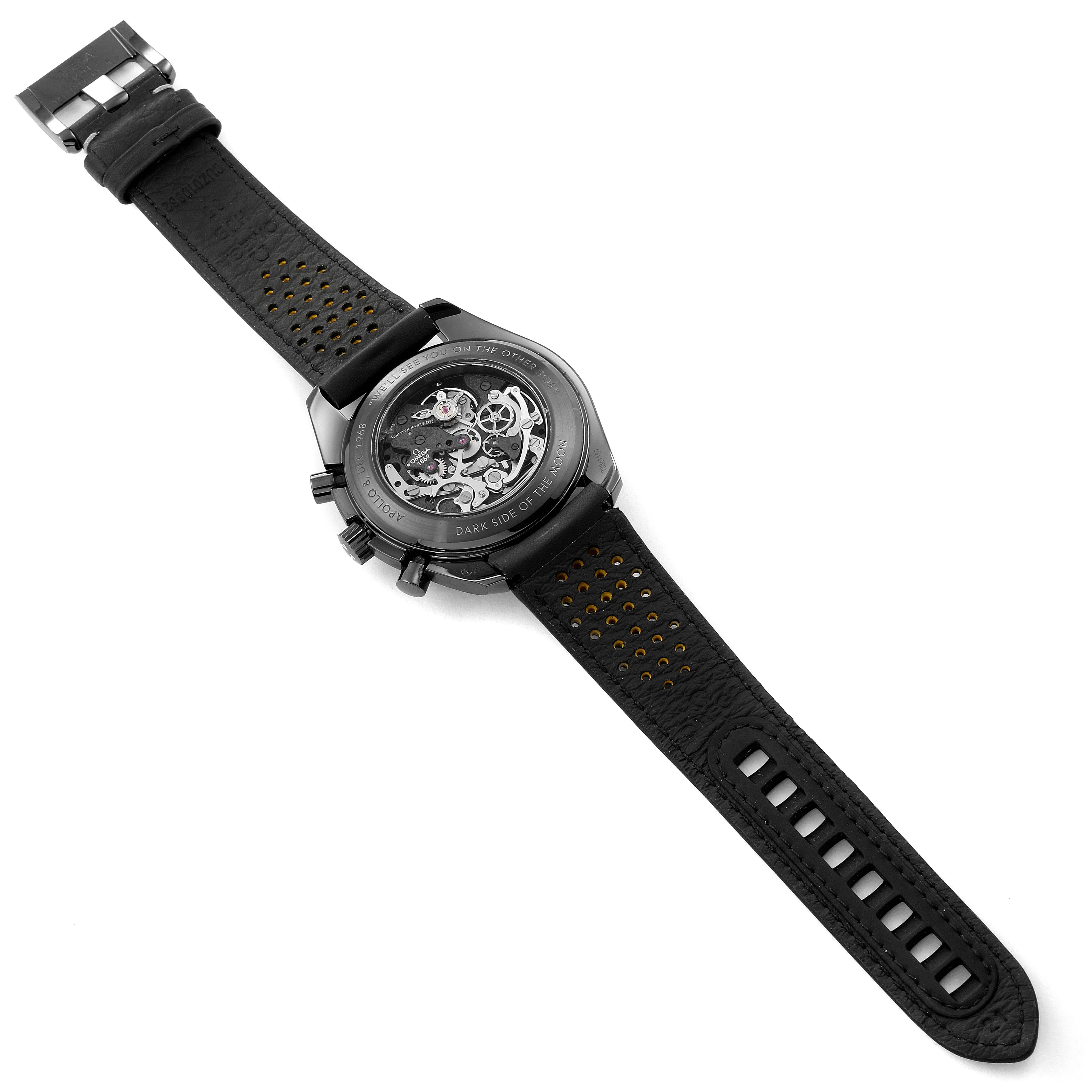 The image shows the back view of an Omega Speedmaster 311.92.44.30.01.001 Men's Titanium Black Dial 311.92.44.30.01.001 Men's Titanium Black Dial watch, highlighting its transparent case back and intricate movement.