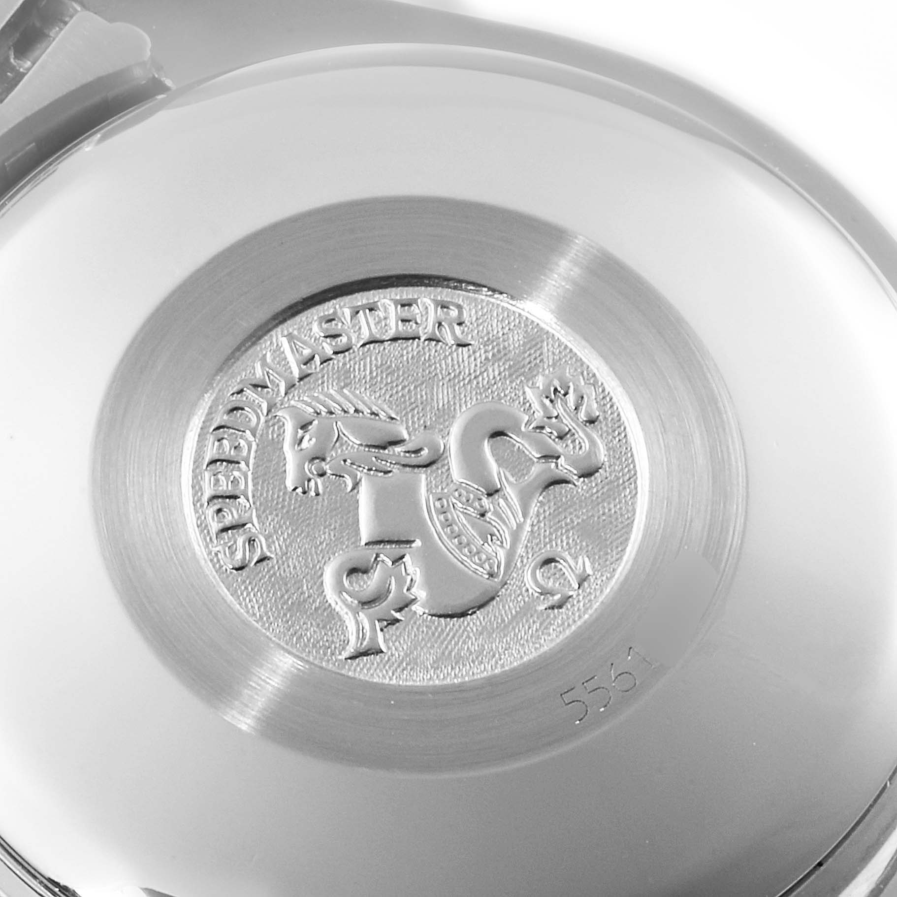 This image shows the case back of an Omega Speedmaster 3520.53.00 Men
s Stainless Steel Grey Dial 3520.53.00 Men
s Stainless Steel Grey Dial watch, featuring the engraved emblem and text.