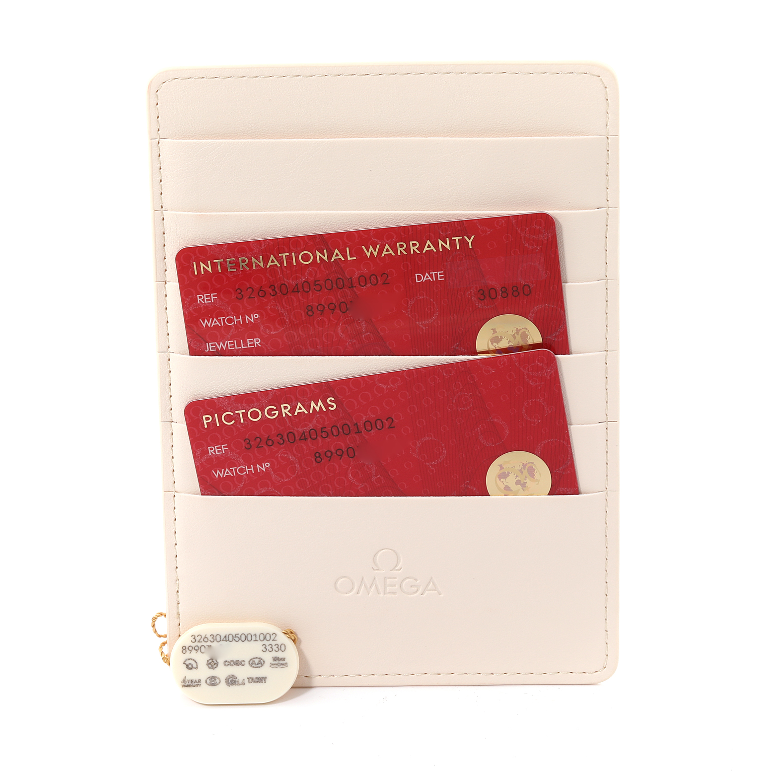 The image shows the warranty cards and hang tag for an Omega Speedmaster 326.30.40.50.01.002 Men
s Stainless Steel Black Dial 326.30.40.50.01.002 Men
s Stainless Steel Black Dial watch.