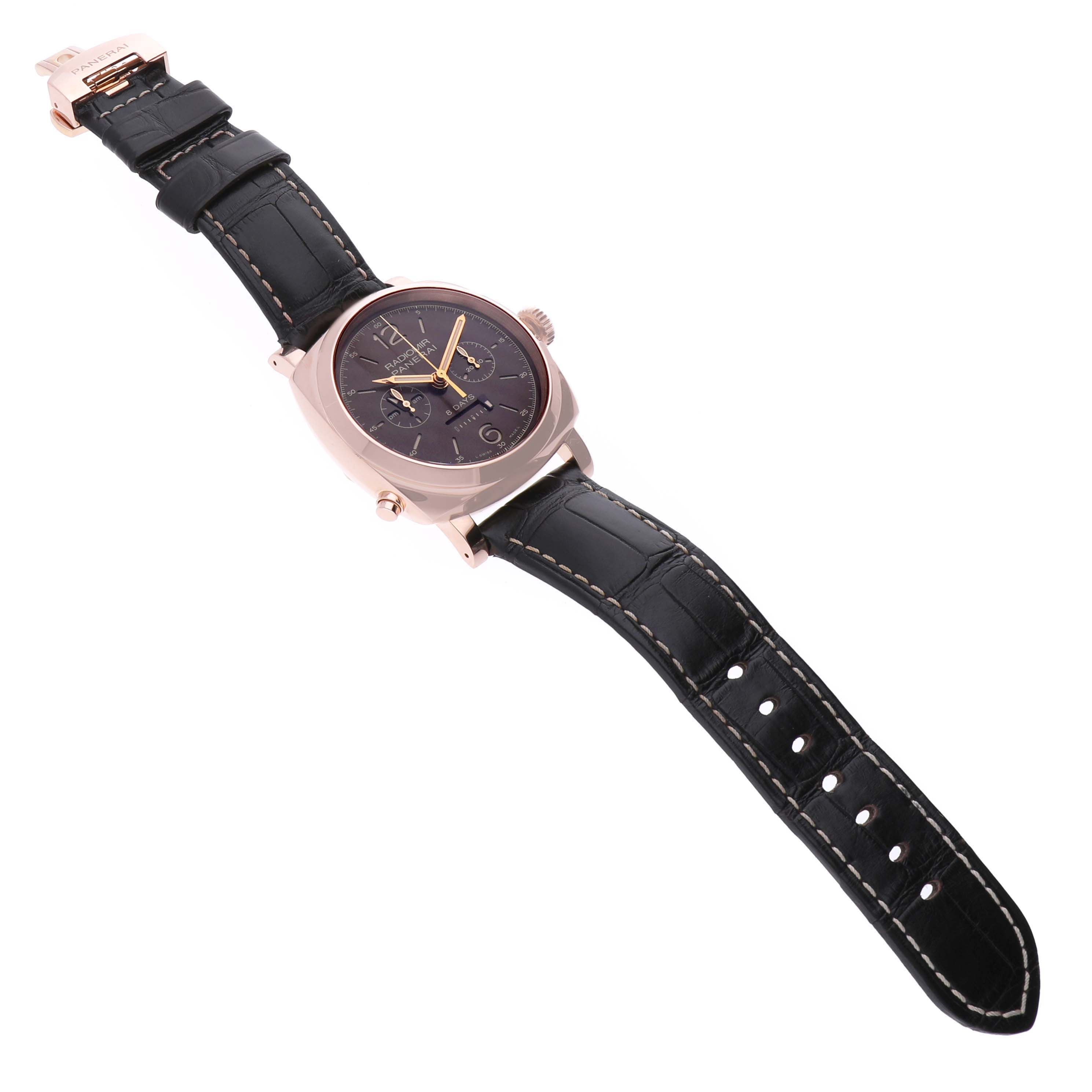 The Panerai Radiomir PAM00502 Men's Rose Gold Brown Dial PAM00502 Men's Rose Gold Brown Dial watch is shown at a slight side angle, displaying the face, strap, and crown clearly.