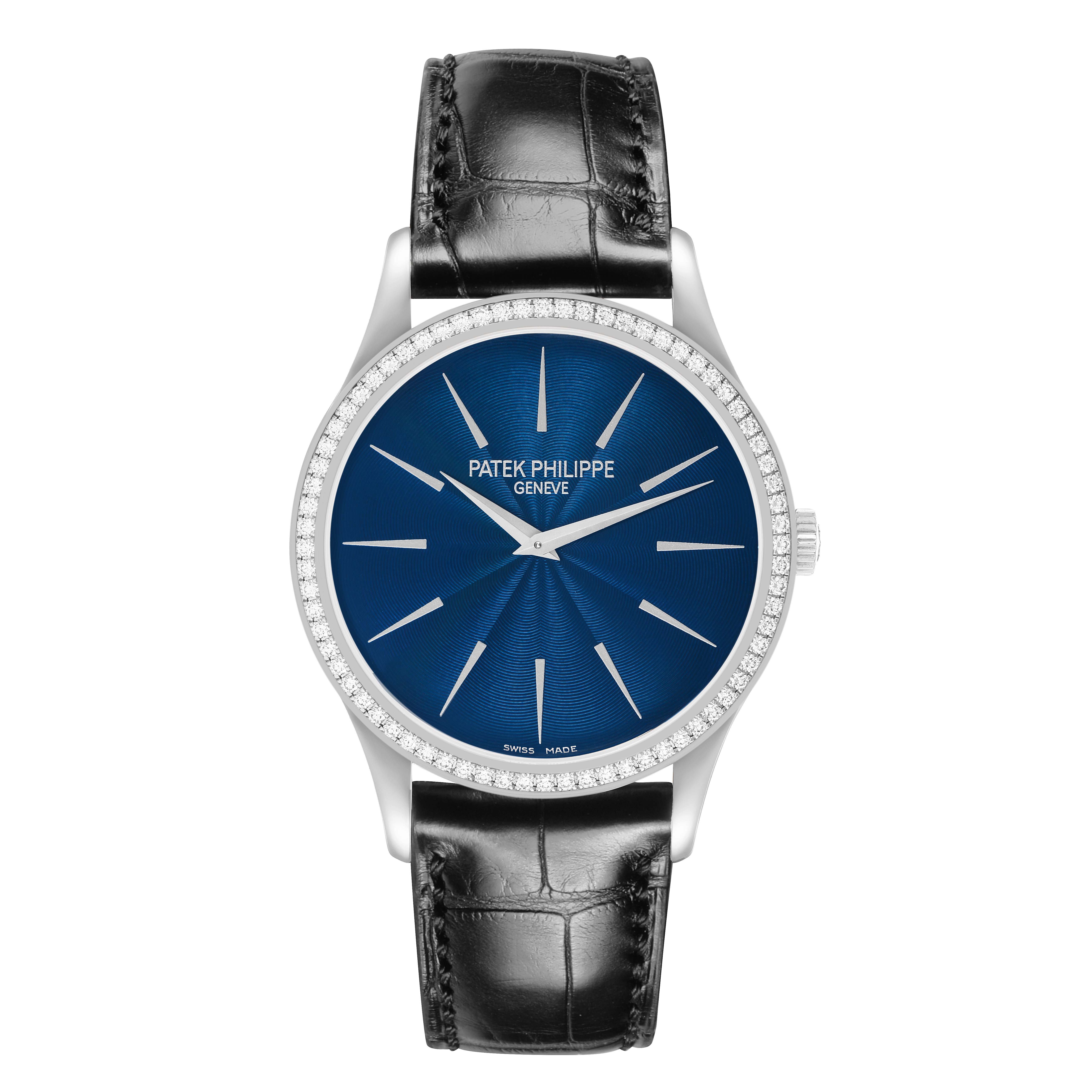 The Patek Philippe Calatrava 4897G Women's White Gold Blue Dial watch is shown from a top-down angle, featuring a blue dial, silver hour markers, and a black leather strap.