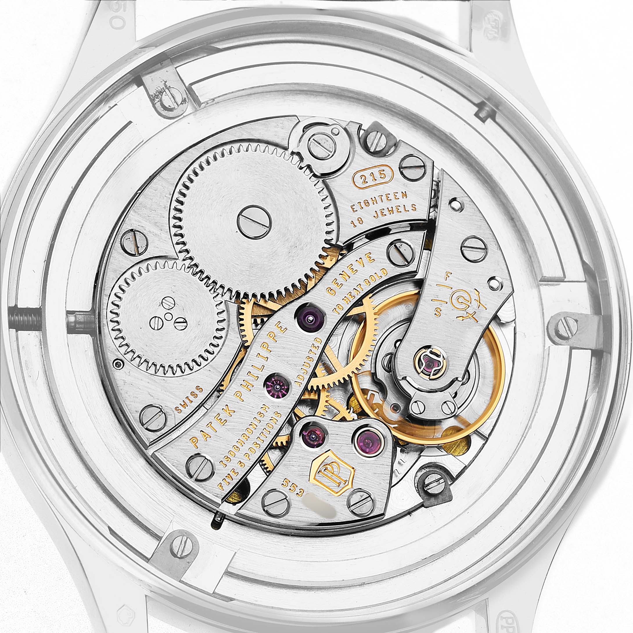 The image shows the movement of a Patek Philippe Calatrava 4897G Women's White Gold Blue Dial watch from a back angle, highlighting gears and components.