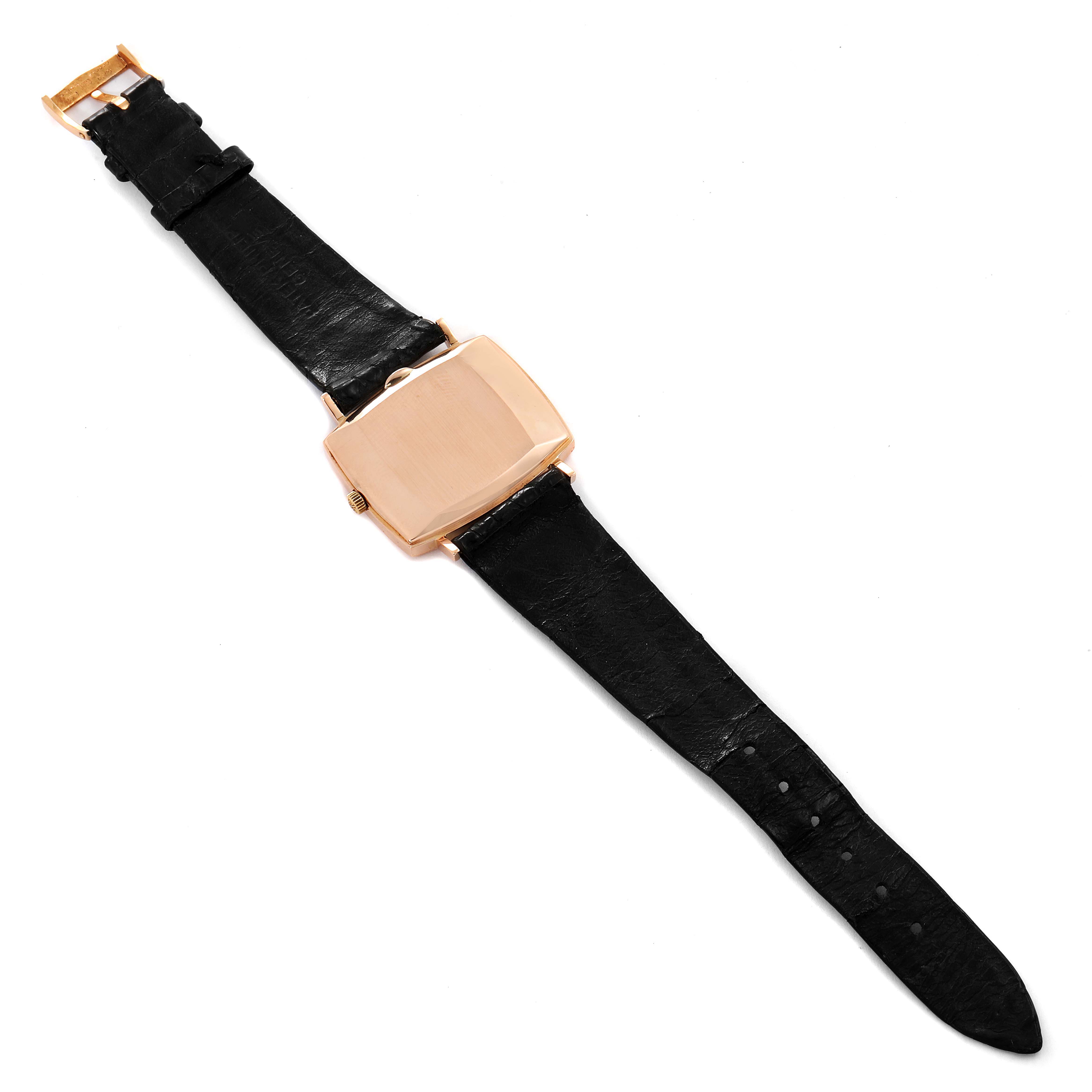 The image shows the back view of a Vintage Patek Philippe watch, displaying the strap and case back.