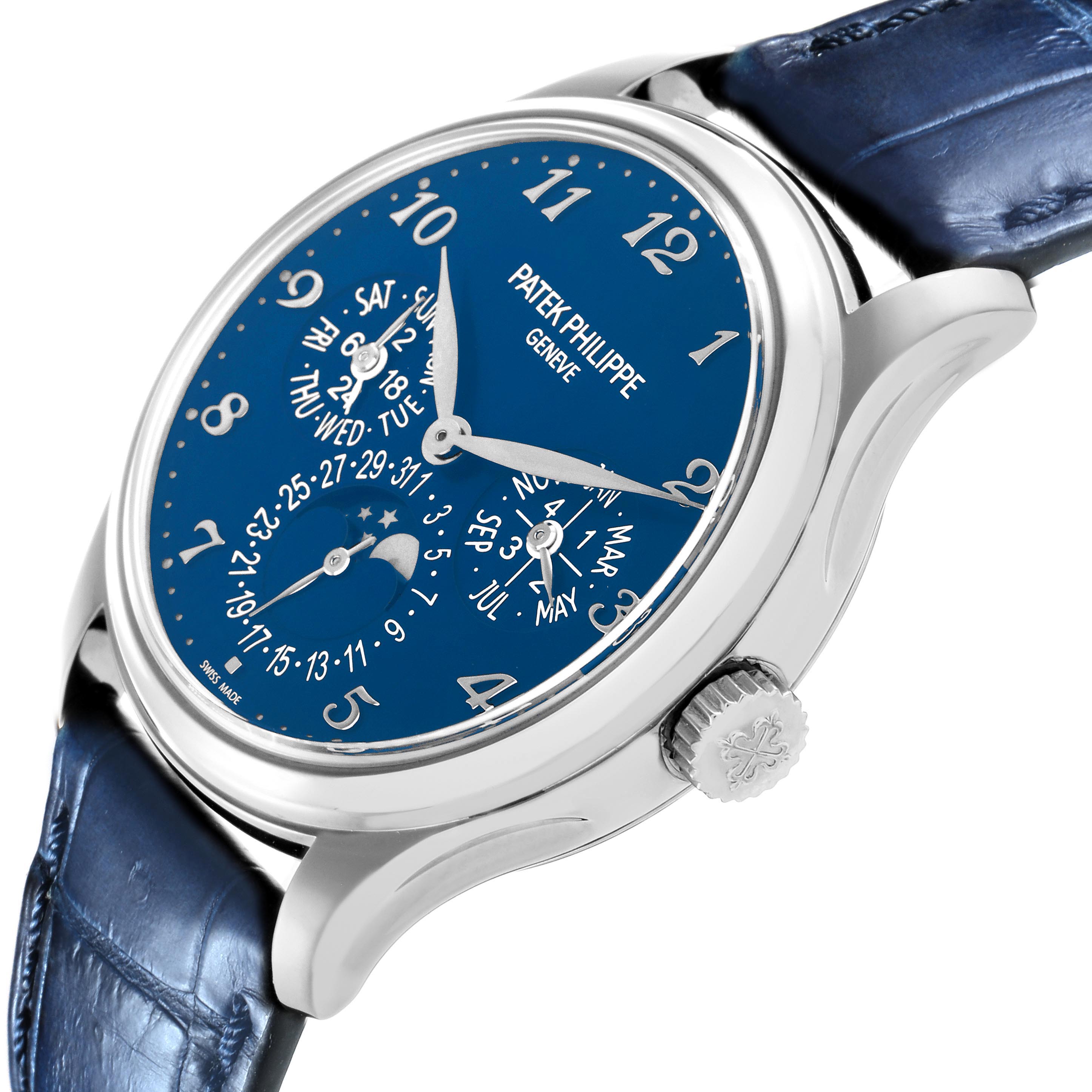 The image shows a side angle of the Patek Philippe Complications 5327G-001 Men's White Gold Blue Dial watch, highlighting the blue dial, numerals, and crown.