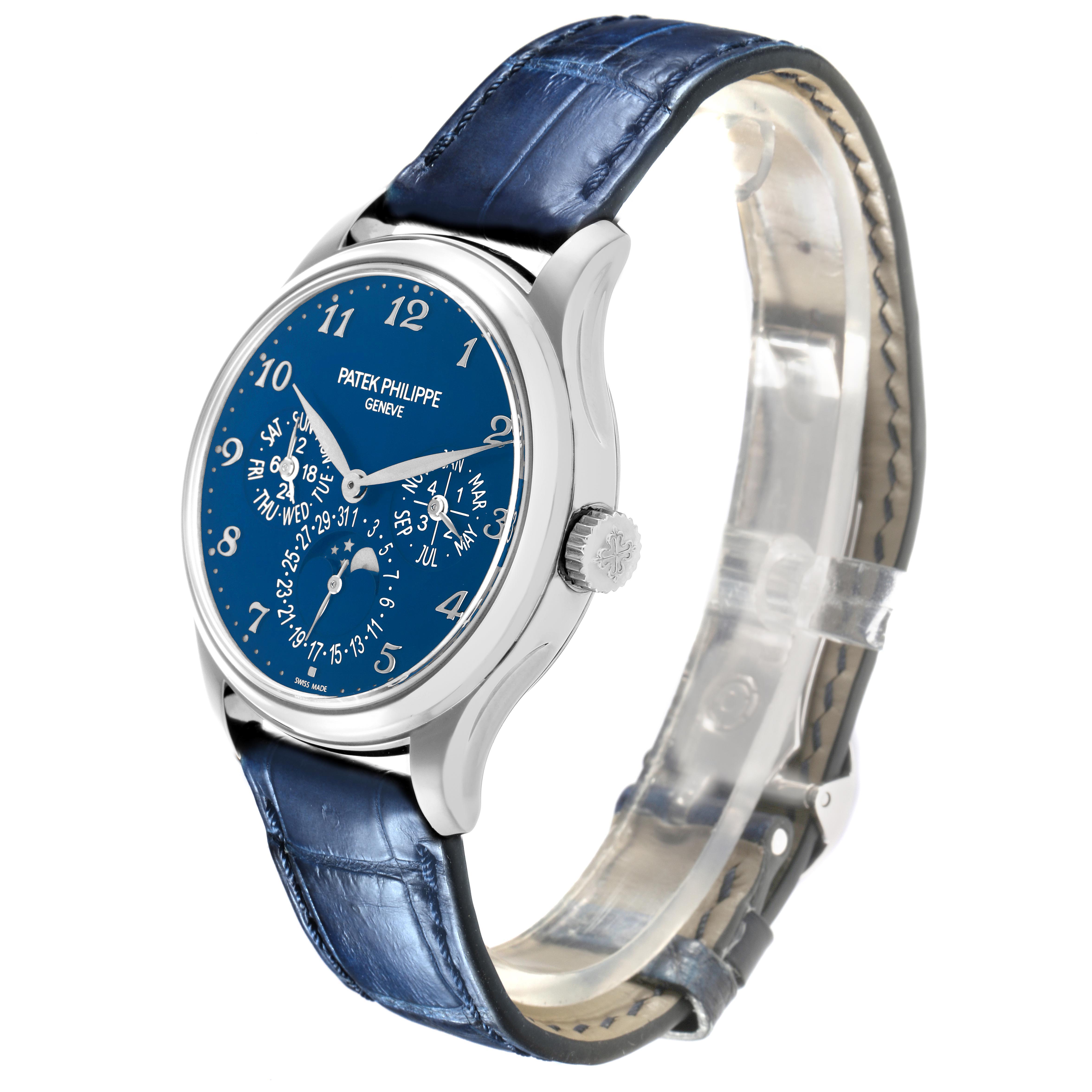 The Patek Philippe Complications 5327G-001 Men's White Gold Blue Dial model is shown at a slight angle, highlighting the blue dial and leather strap.