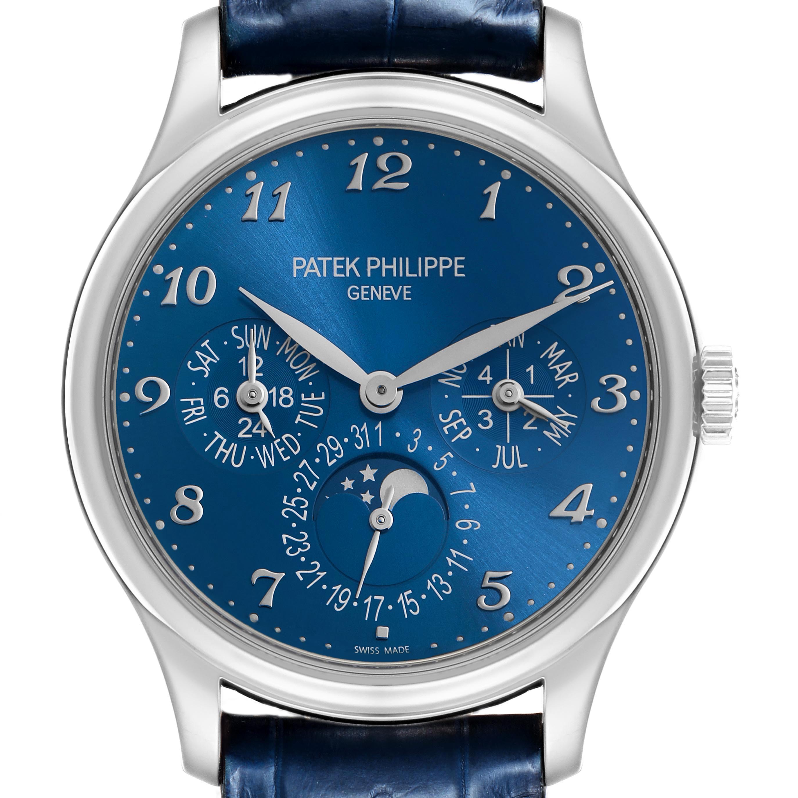 The Patek Philippe Complications 5327G-001 Men's White Gold Blue Dial watch is shown from a front angle, highlighting its blue dial, hour markers, and calendar subdials.