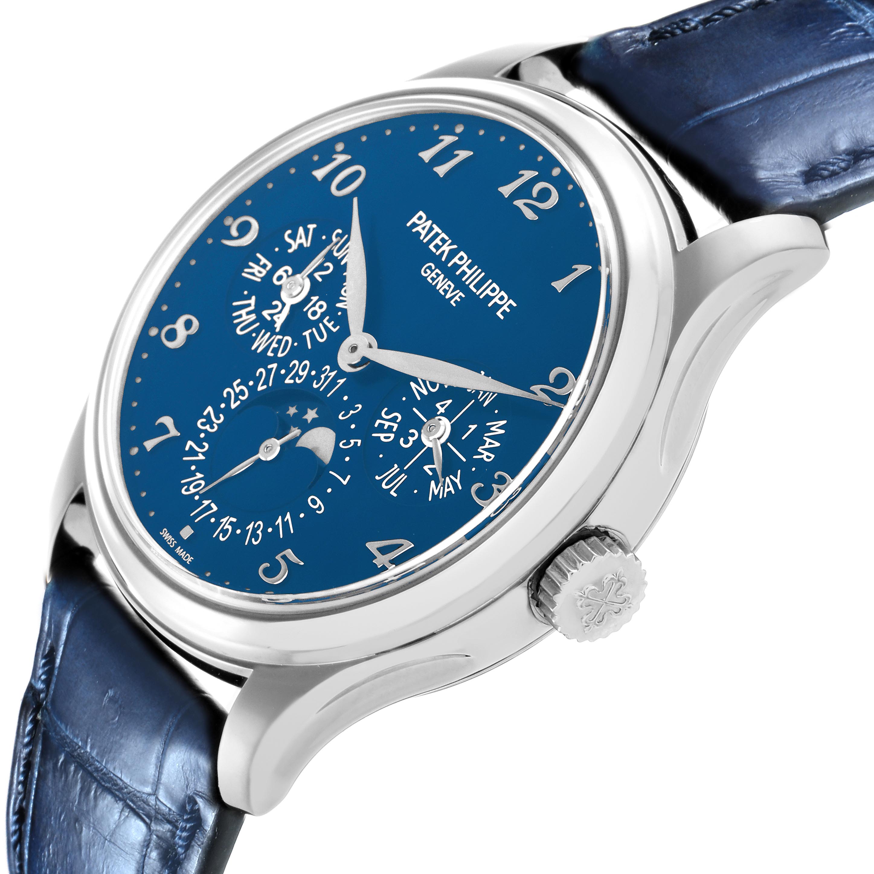 The Patek Philippe Complications 5327G-001 Men's White Gold Blue Dial watch is shown at an angle highlighting the dial, crown, and part of the blue strap.