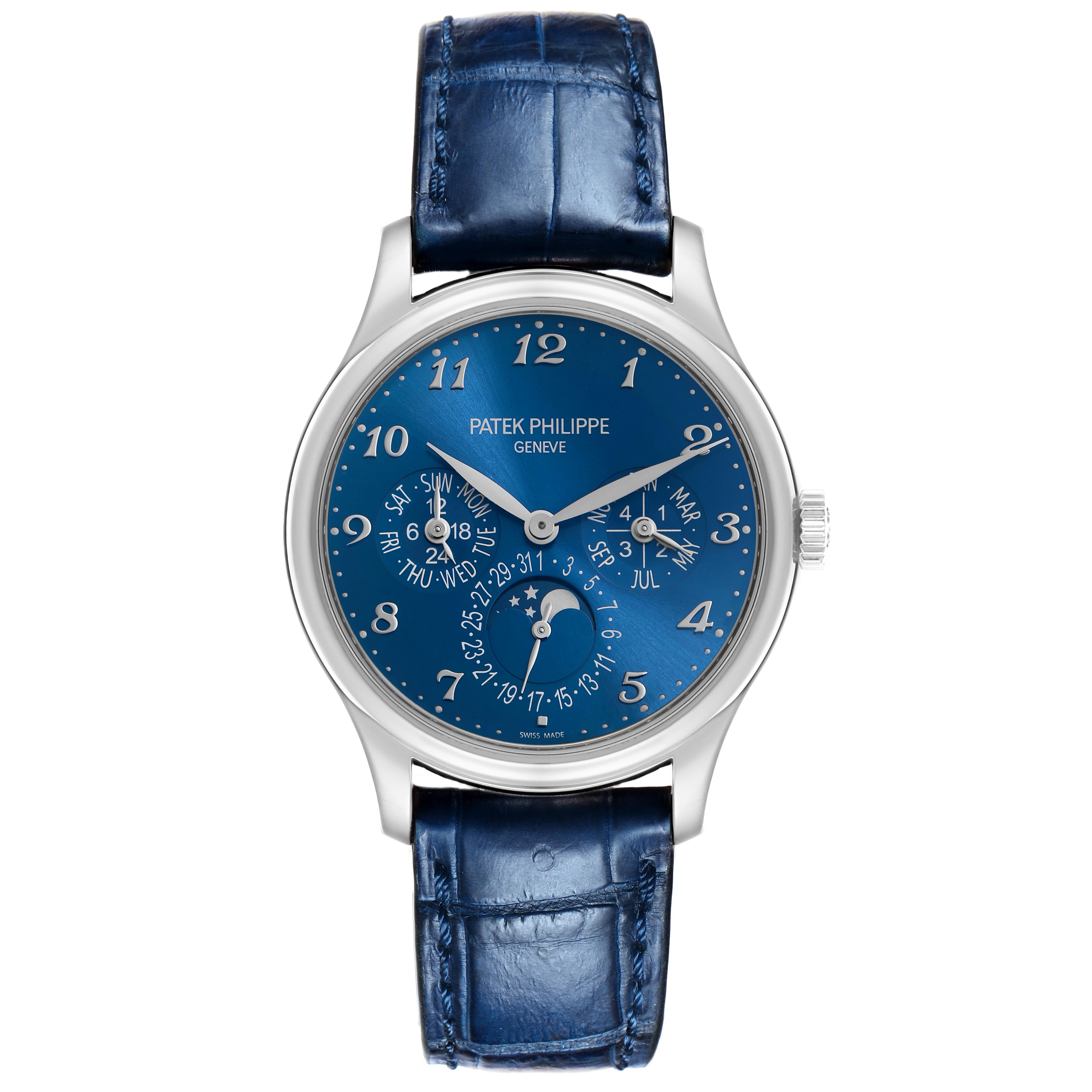 The image shows a Patek Philippe Complications 5327G-001 Men's White Gold Blue Dial watch from a front angle, displaying its dial and blue leather strap.