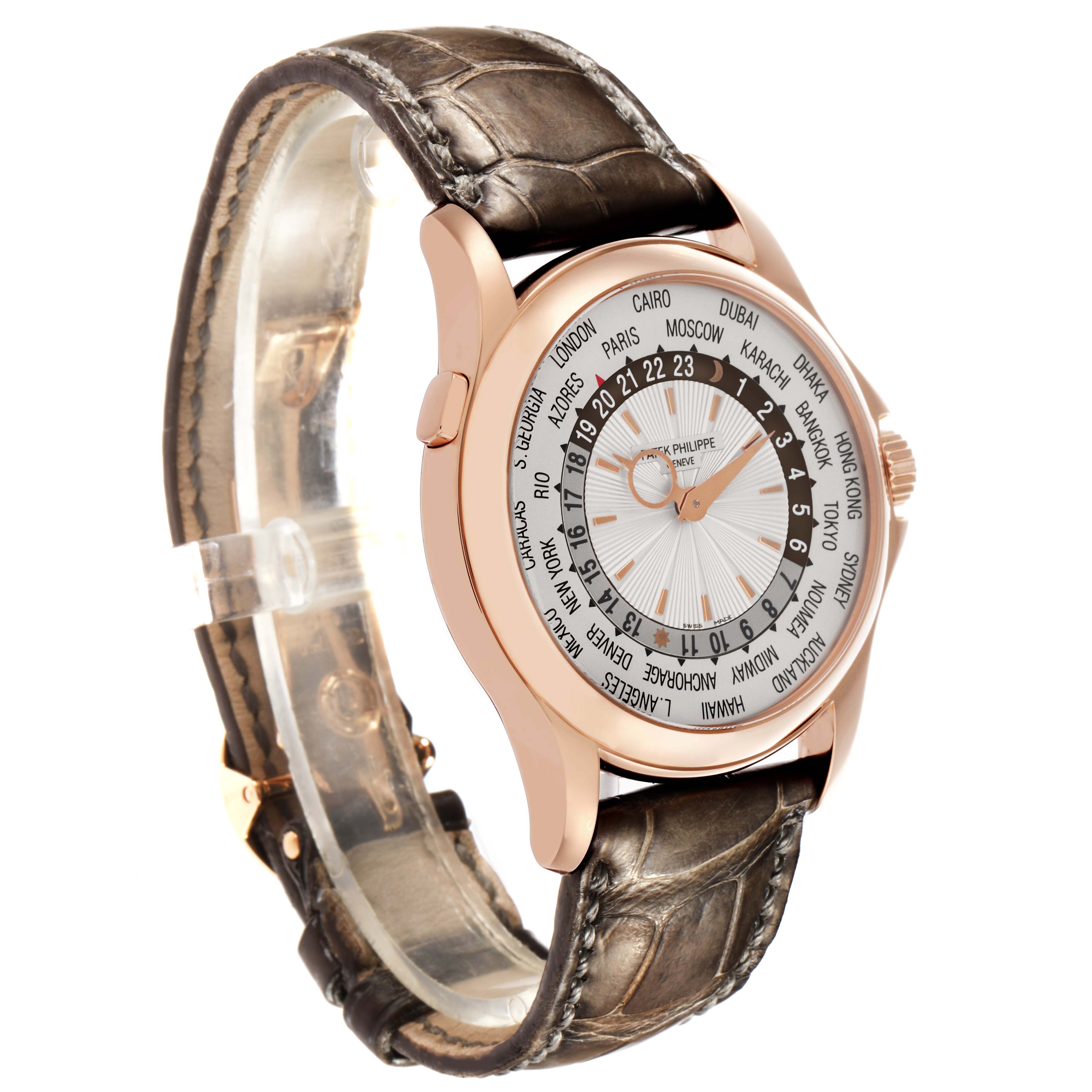 The Patek Philippe Complications 5130R Men's Rose Gold Silver Dial watch is shown at a three-quarter angle, highlighting the dial, case, and leather strap.