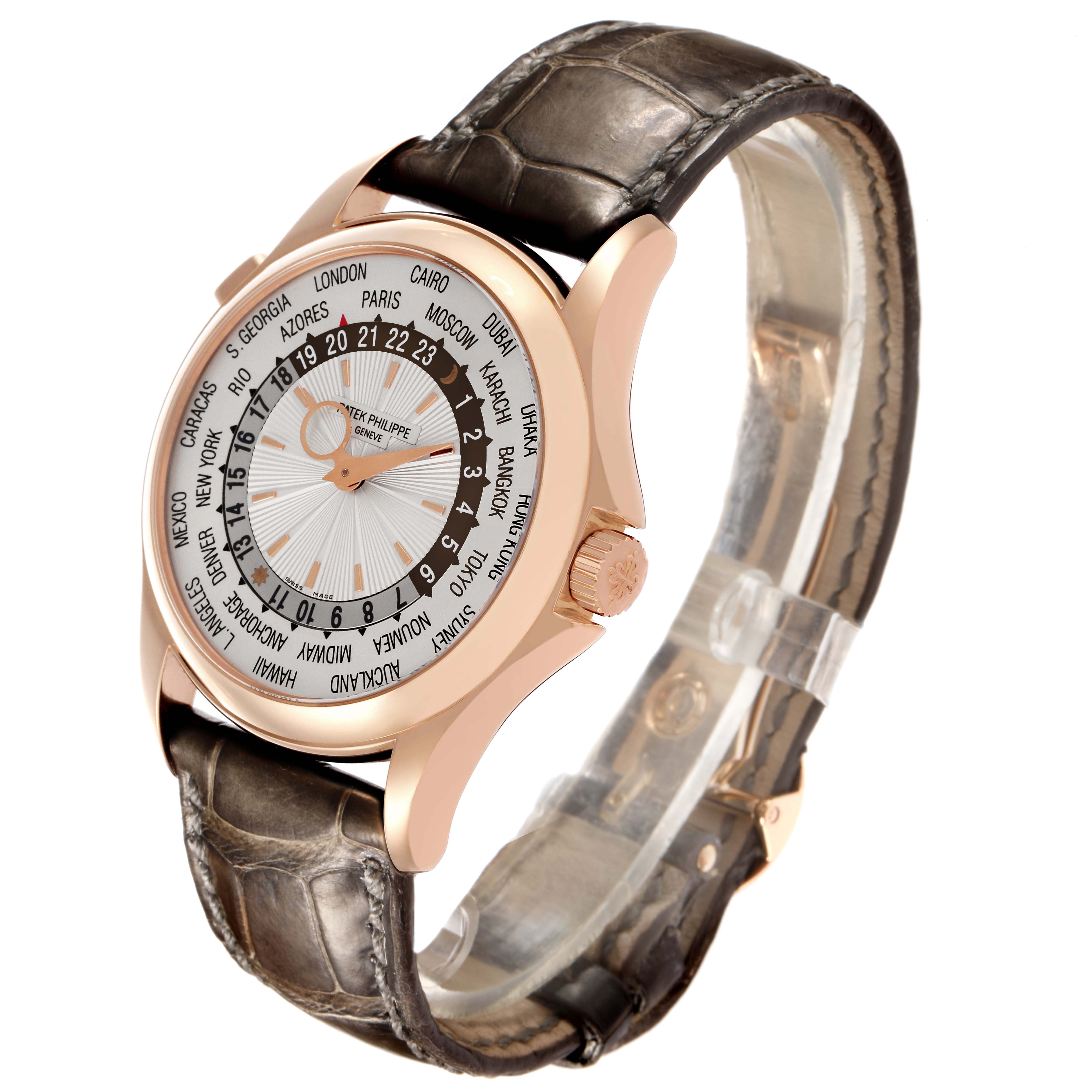 The Patek Philippe Complications 5130R Men's Rose Gold Silver Dial watch is shown at a three-quarter angle, highlighting the case, dial, and leather strap.