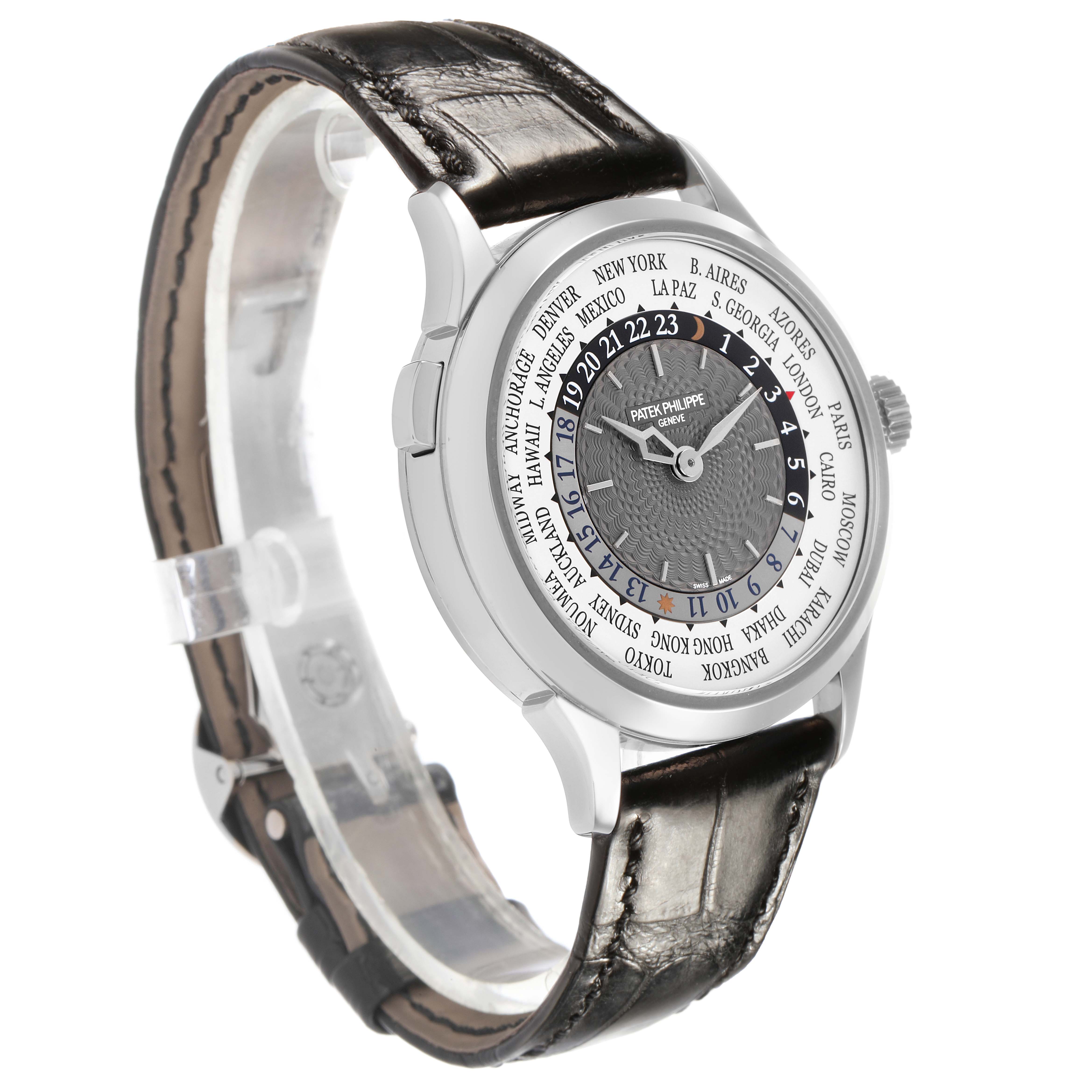 The Patek Philippe Complications 5230G Men's White Gold Grey Dial watch is shown at an angled side view, displaying the dial, strap, and crown.