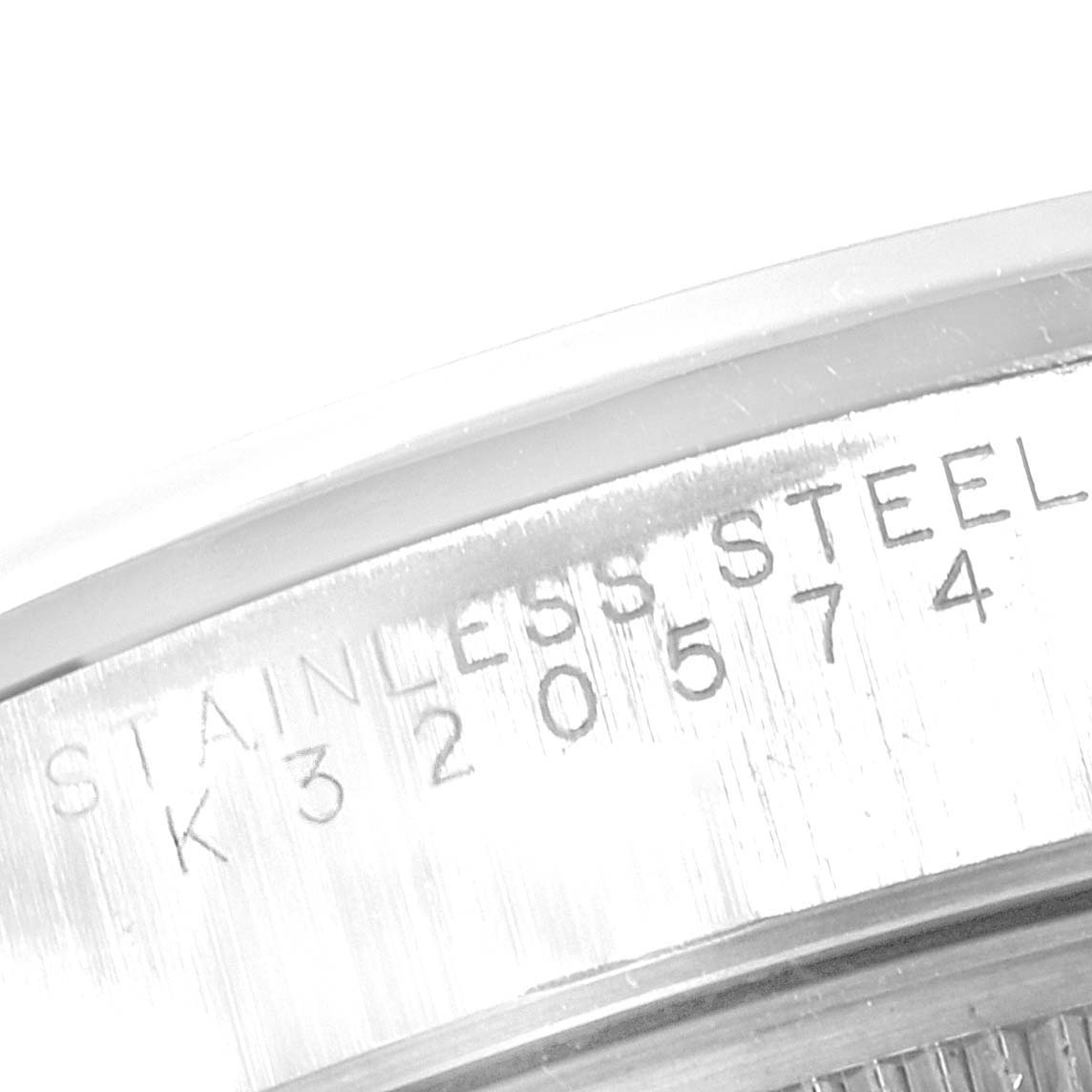 The image shows a close-up of the serial number and material inscription on the stainless steel case of a Rolex Air-King 14000 Men's Stainless Steel Blue Dial 14000 Men's Stainless Steel Blue Dial watch.
