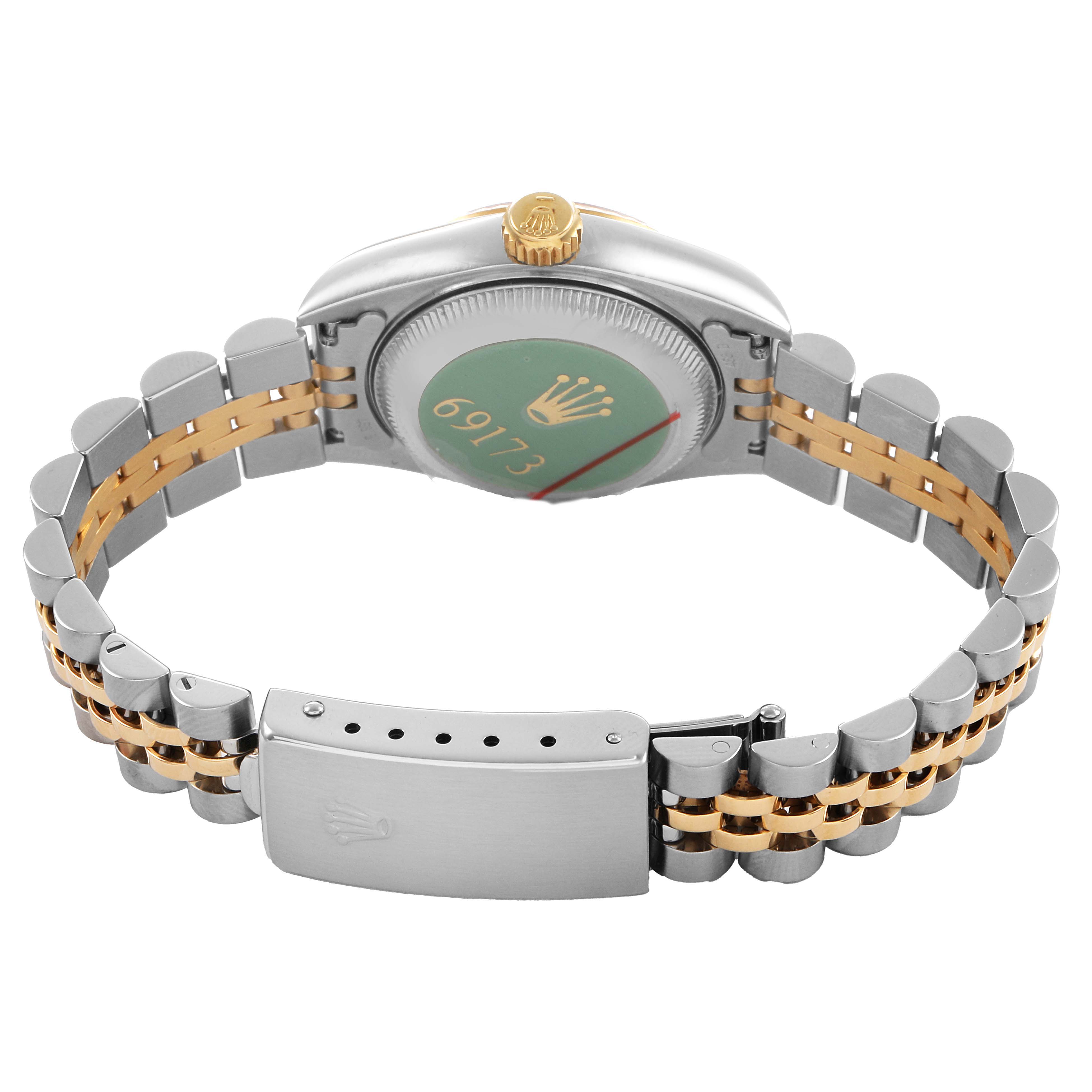 The image shows the back of a Rolex Datejust 69173 Women's Steel and Gold (two tone) Champagne Dial watch, highlighting the case back, crown, and jubilee bracelet.