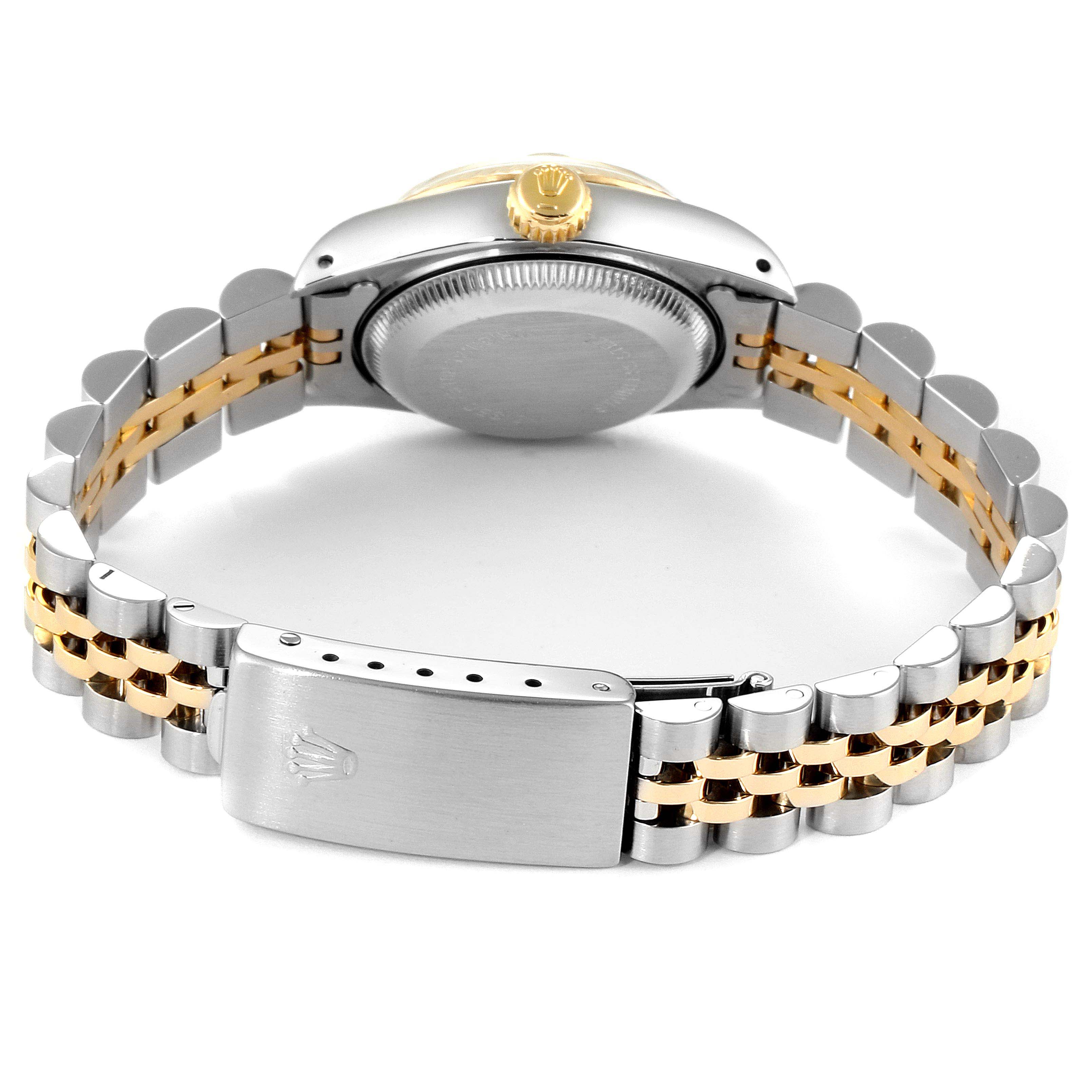 This image shows the back view of a Rolex Datejust 69173 Women's Stainless Steel Champagne Dial 69173 Women's Stainless Steel Champagne Dial watch, focusing on the case back, crown, and bi-metal bracelet with clasp.