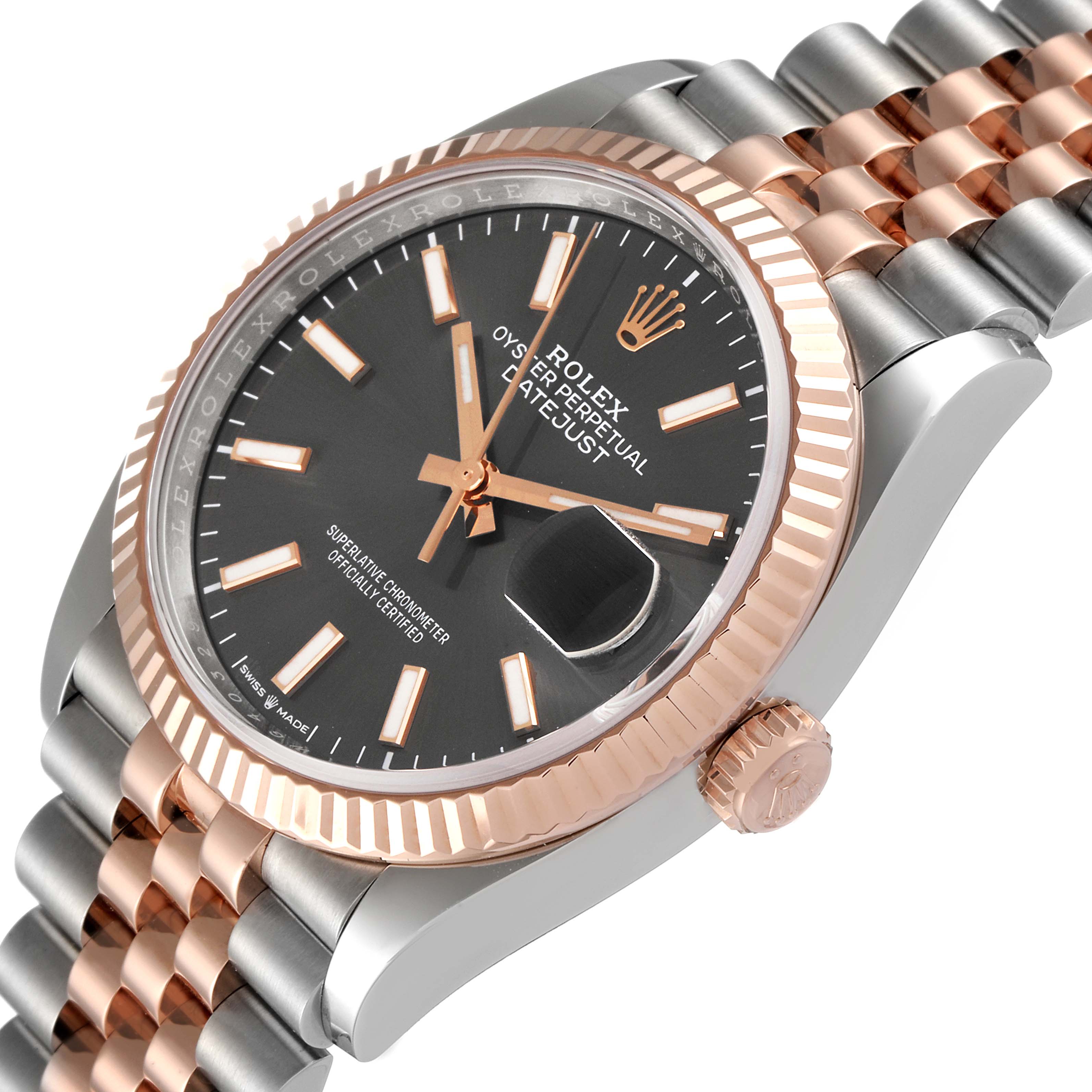 This image shows a close-up angle of the Rolex Datejust 126231 Men
s Steel and Gold (two tone) Grey Dial 126231 Men
s Steel and Gold (two tone) Grey Dial watch, highlighting the dial, bezel, crown, and bracelet.