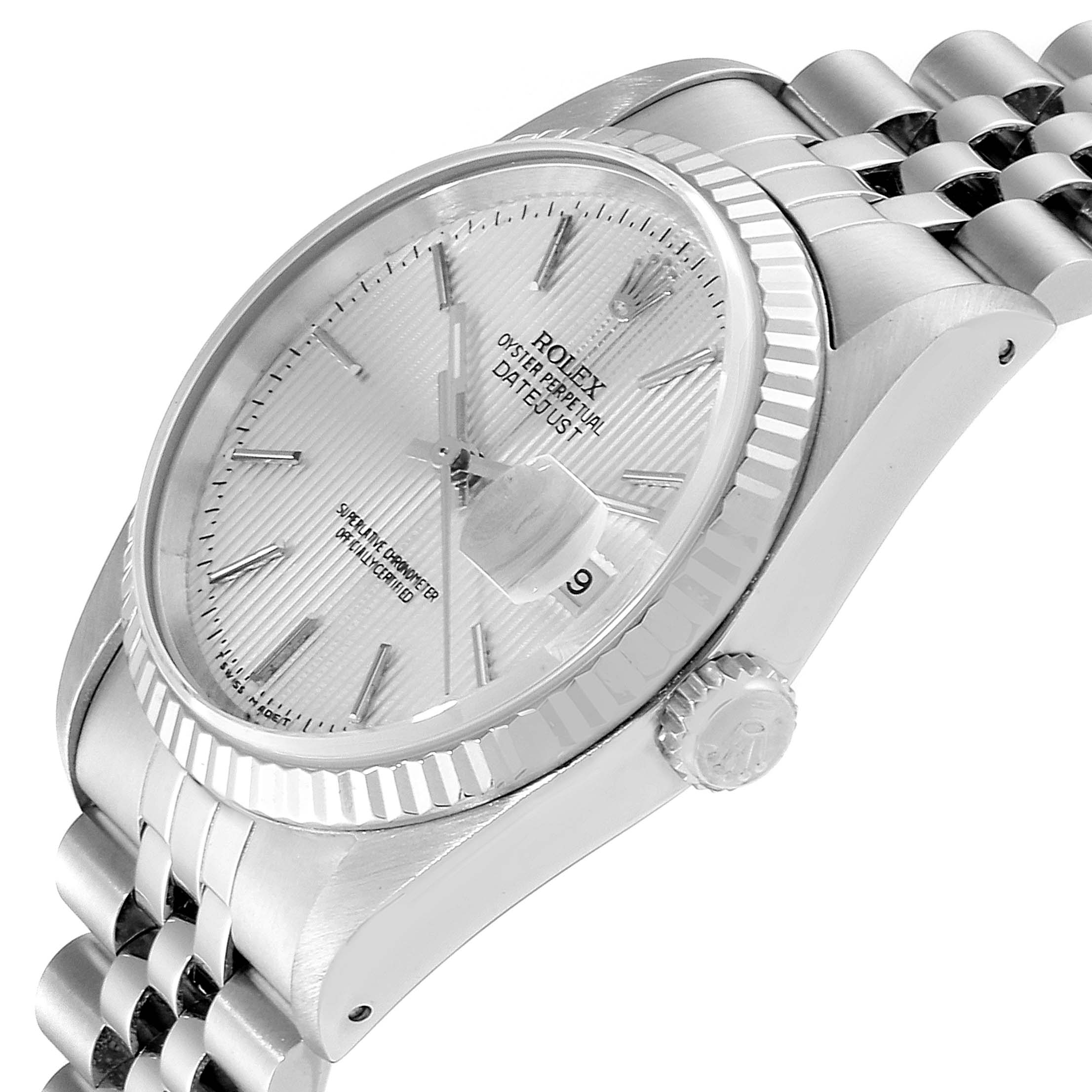The image shows a side view of a Rolex Datejust 16234 Men's Stainless Steel Silver Dial 16234 Men's Stainless Steel Silver Dial watch highlighting the crown, bezel, case, and part of the bracelet.