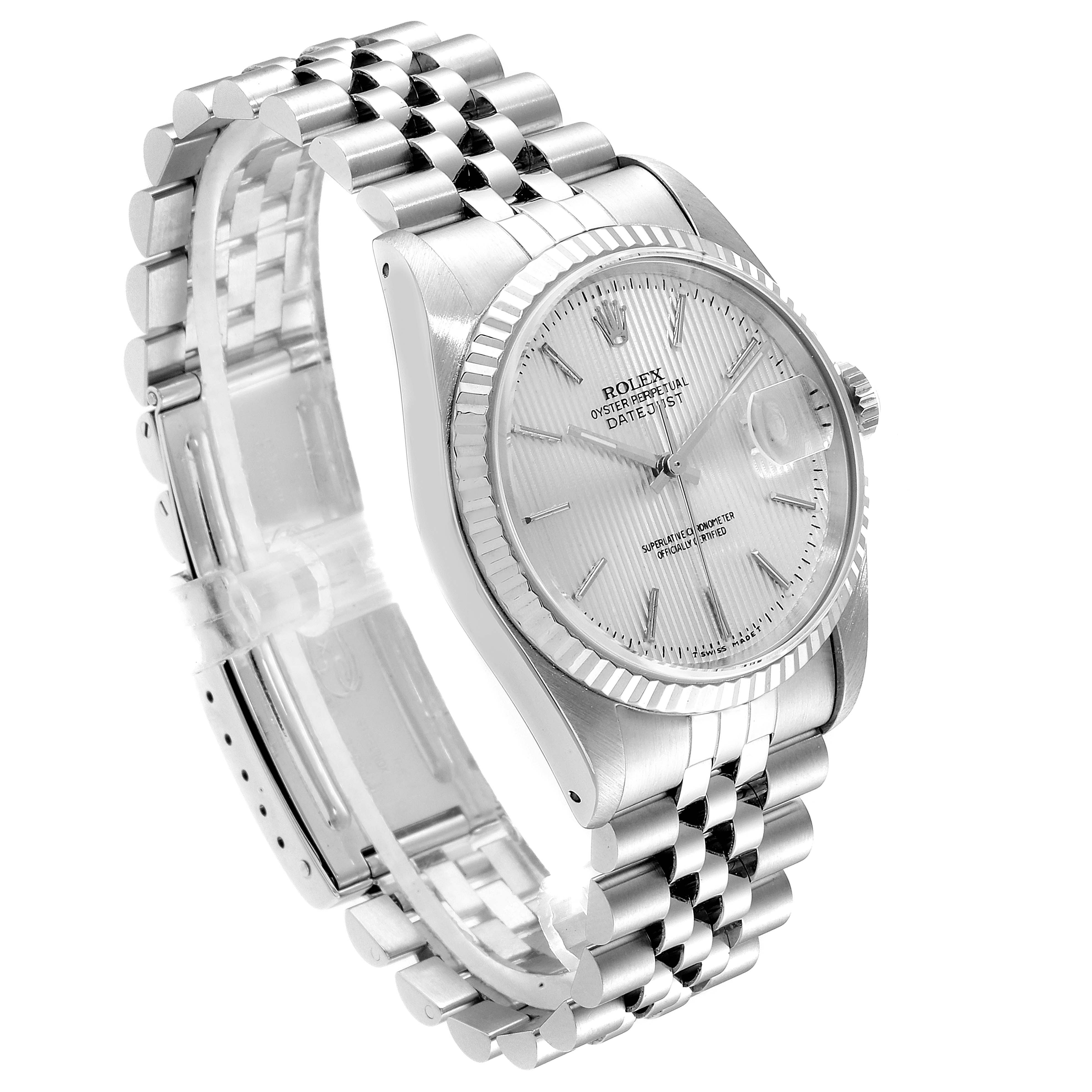This is a Rolex Datejust 16234 Men's Stainless Steel Silver Dial 16234 Men's Stainless Steel Silver Dial watch shown at a three-quarter angle, highlighting its silver dial, fluted bezel, and Jubilee bracelet.