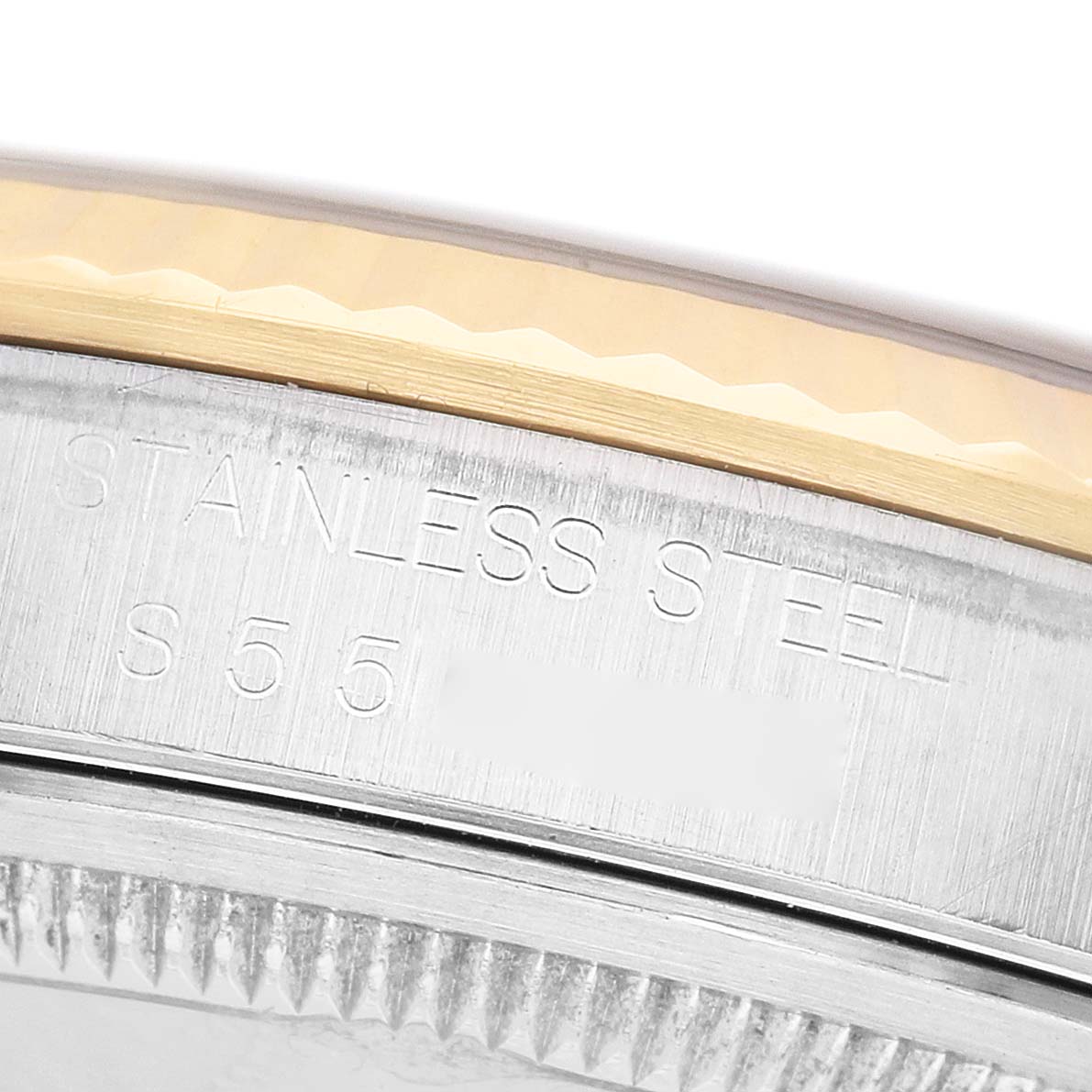 The image shows a close-up of the side of a Rolex Datejust 16233 Men's Steel and Gold (two tone) White Dial watch, highlighting the stainless steel and bezel.