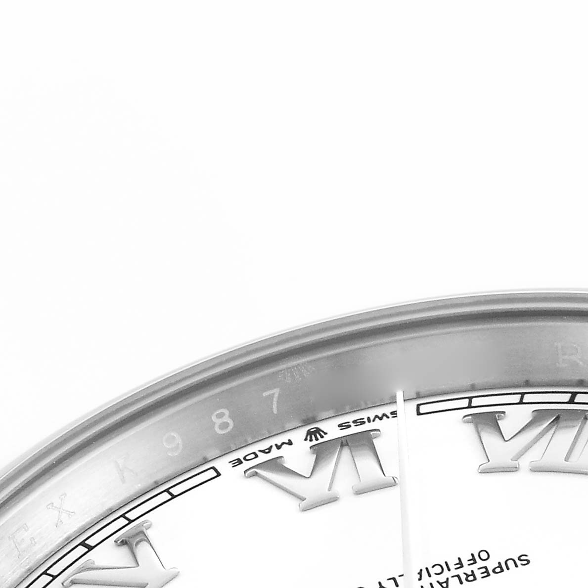The image shows a close-up of the Rolex Datejust 41 126300 Men's Stainless Steel White Dial 126300 Men's Stainless Steel White Dial's dial edge, displaying Roman numerals and part of the bezel.