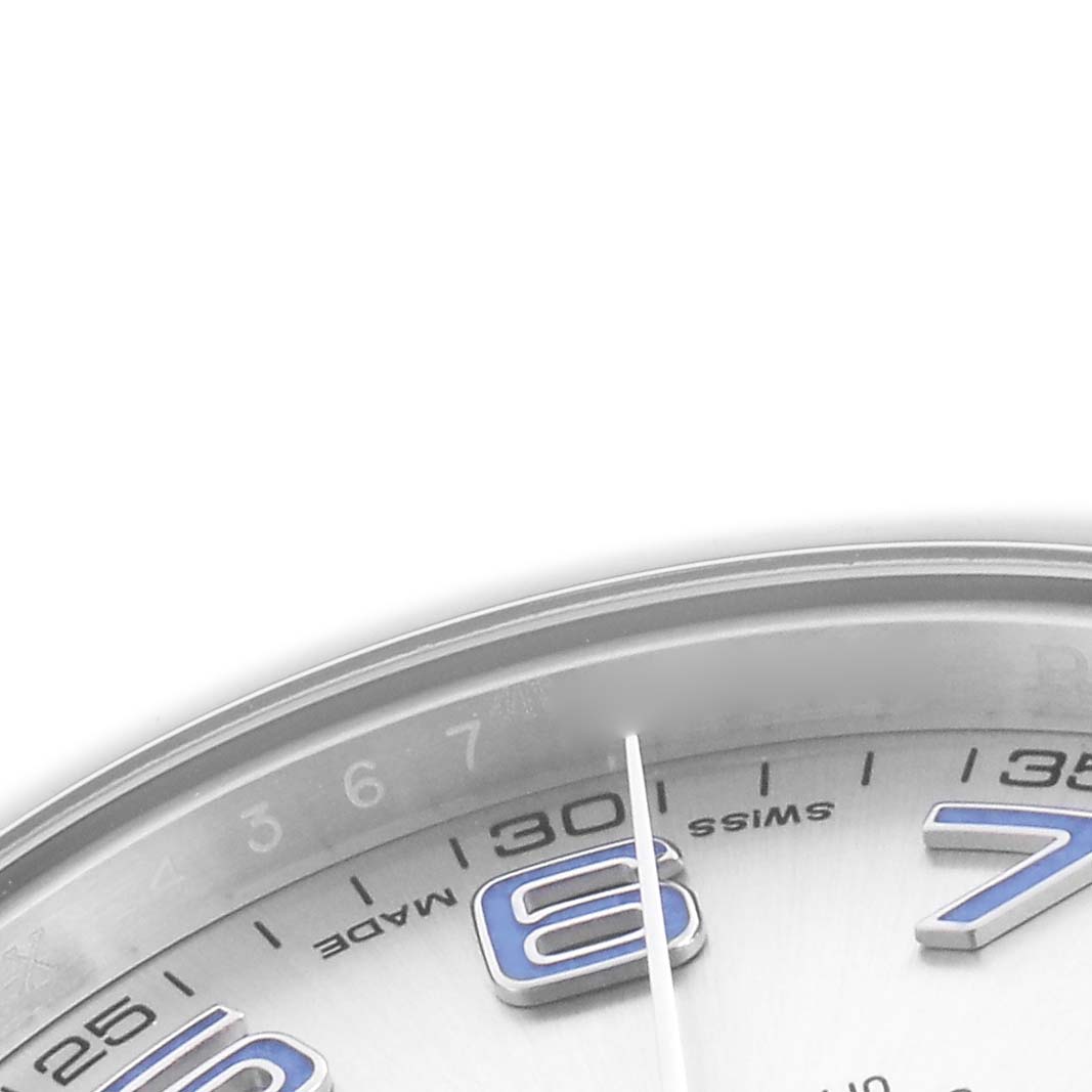 The image shows a close-up of the Rolex Datejust 41 116300 Men
s Stainless Steel Silver Dial 116300 Men
s Stainless Steel Silver Dial, focusing on the dial with visible hour markers and part of the second hand.