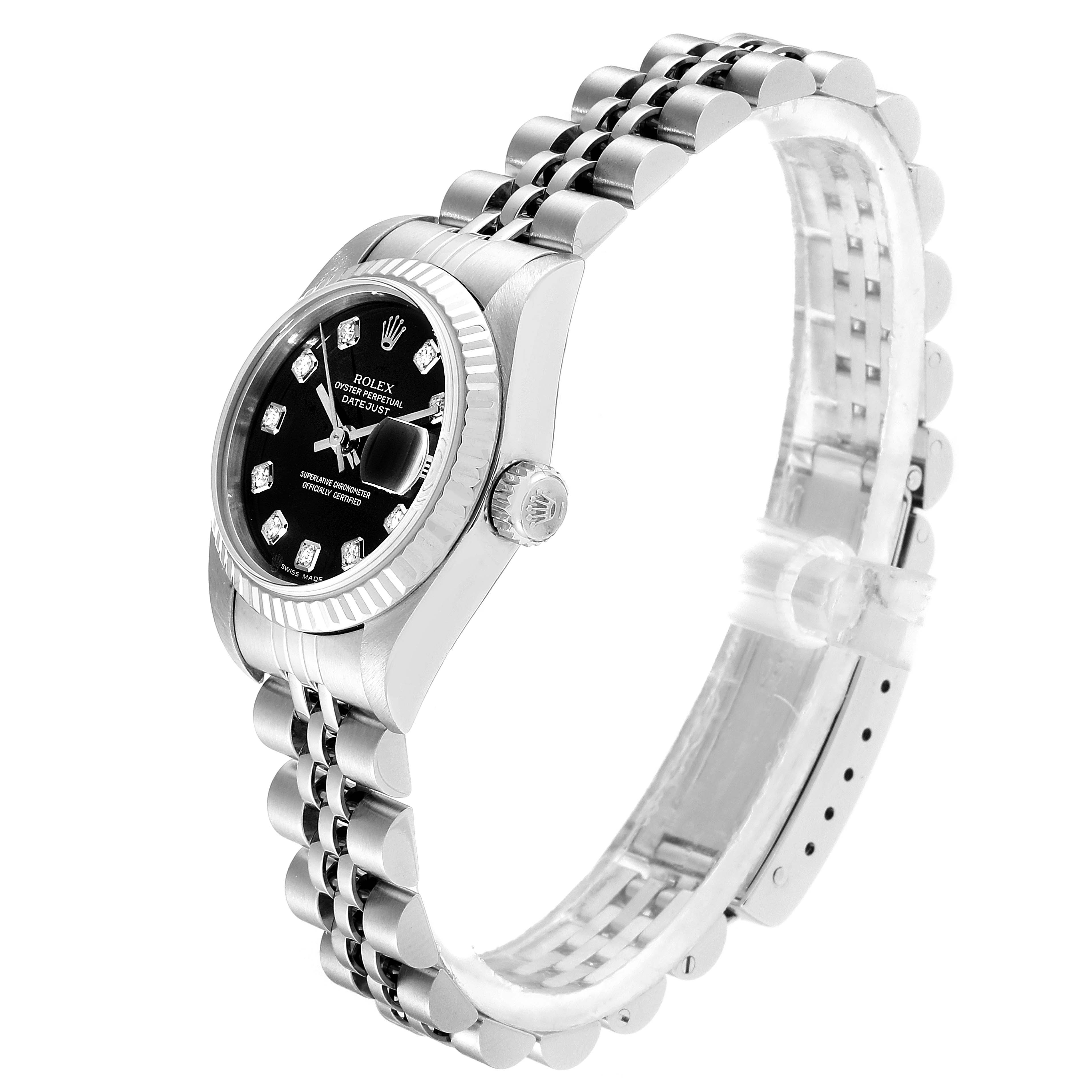 The image shows a Rolex Datejust 79174 Women
s Stainless Steel Black Dial 79174 Women
s Stainless Steel Black Dial watch from a side angle focusing on the dial, bezel, and bracelet.