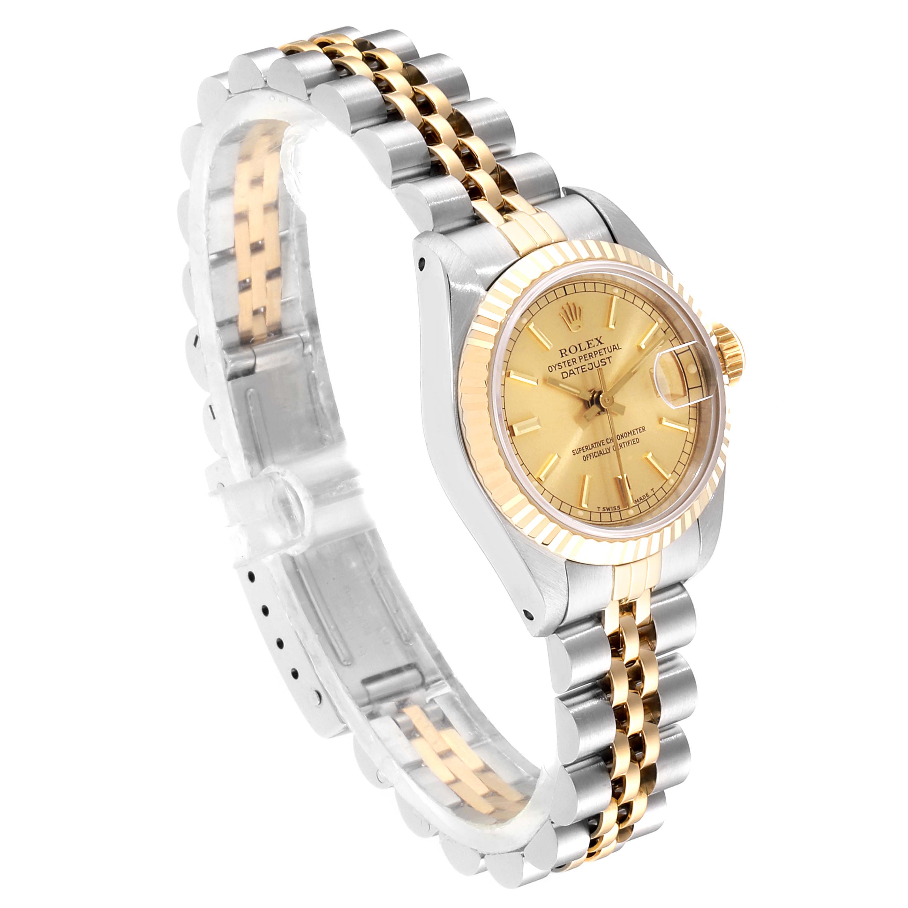 The image shows a side and angled view of the Rolex Datejust 69173 Women's Steel and Gold (two tone) Champagne Dial 69173 Women's Steel and Gold (two tone) Champagne Dial watch, highlighting its gold and silver band and gold dial.