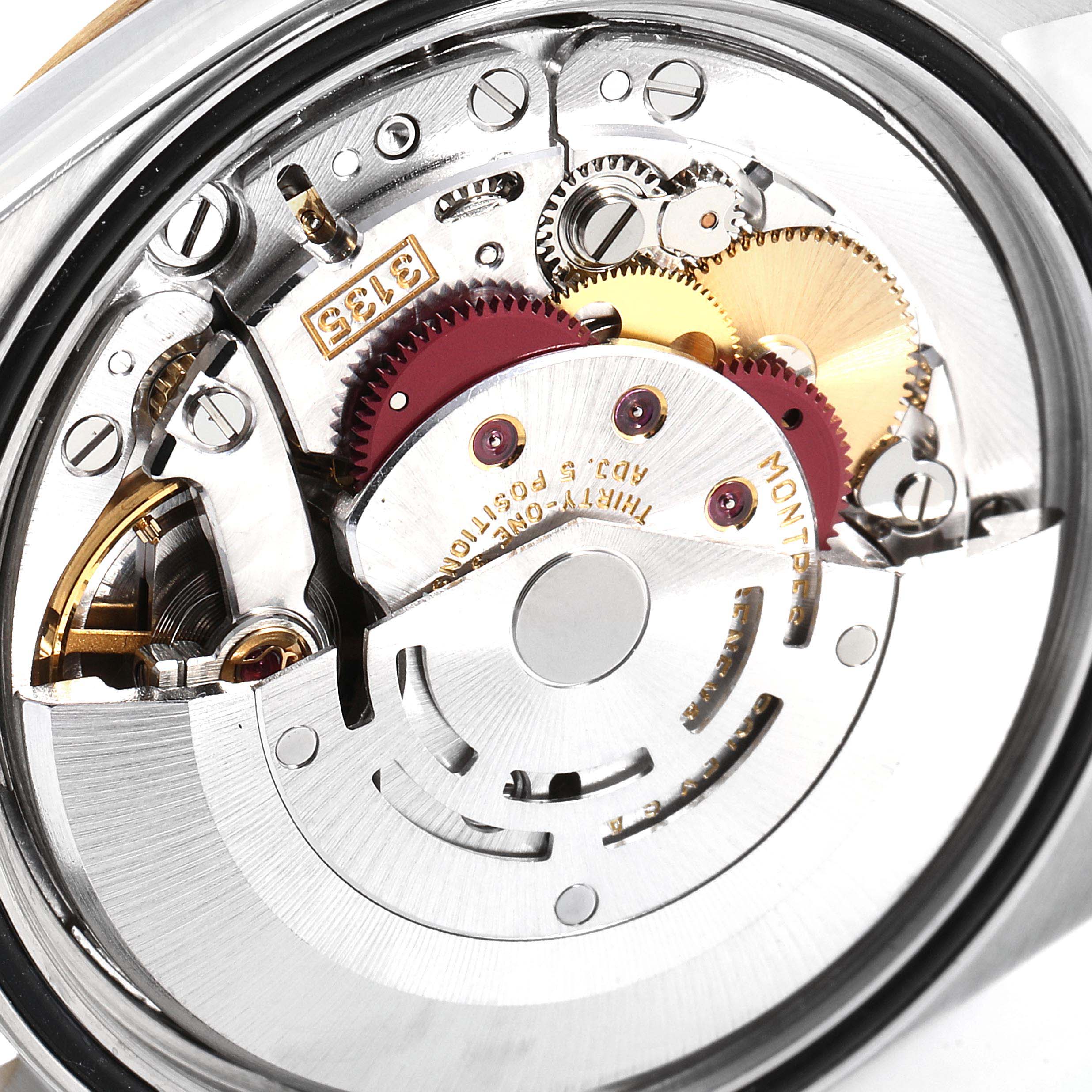 This image shows the movement mechanism of a Rolex Datejust 16233 Men's Stainless Steel White Dial 16233 Men's Stainless Steel White Dial watch from a close-up angle.