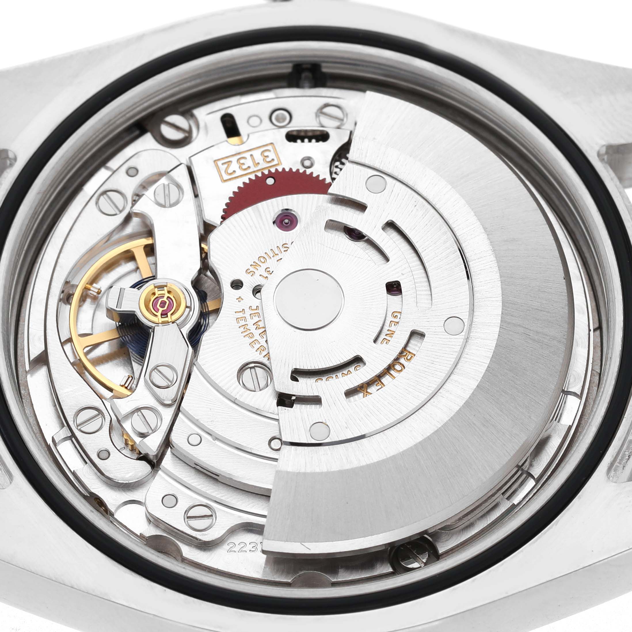 The image shows the internal mechanical movement of a Rolex Explorer 214270 Men's Stainless Steel Black Dial watch, viewed from the back.