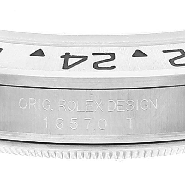 The image shows a close-up side view of the bezel and case of a Rolex Explorer 16570 Men
s Stainless Steel Black Dial 16570 Men
s Stainless Steel Black Dial model with the design number 16570T.