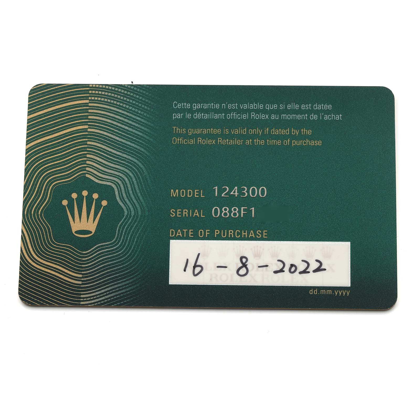 This is a close-up of the guarantee card for the Rolex Oyster Perpetual 124300 Men's Stainless Steel Black Dial 124300 Men's Stainless Steel Black Dial model 124300.