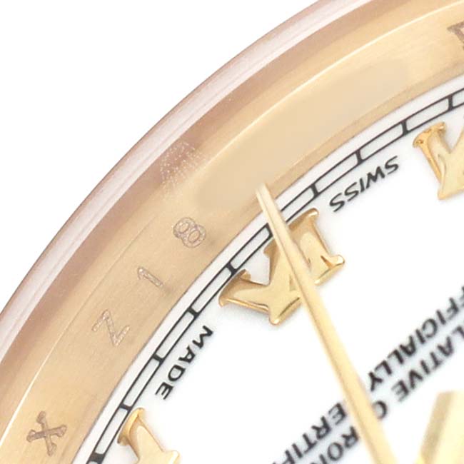 The image shows a partial close-up of the Rolex President 179178 Women's Yellow Gold White Dial watch's dial, focusing on the Roman numerals and minute markings.