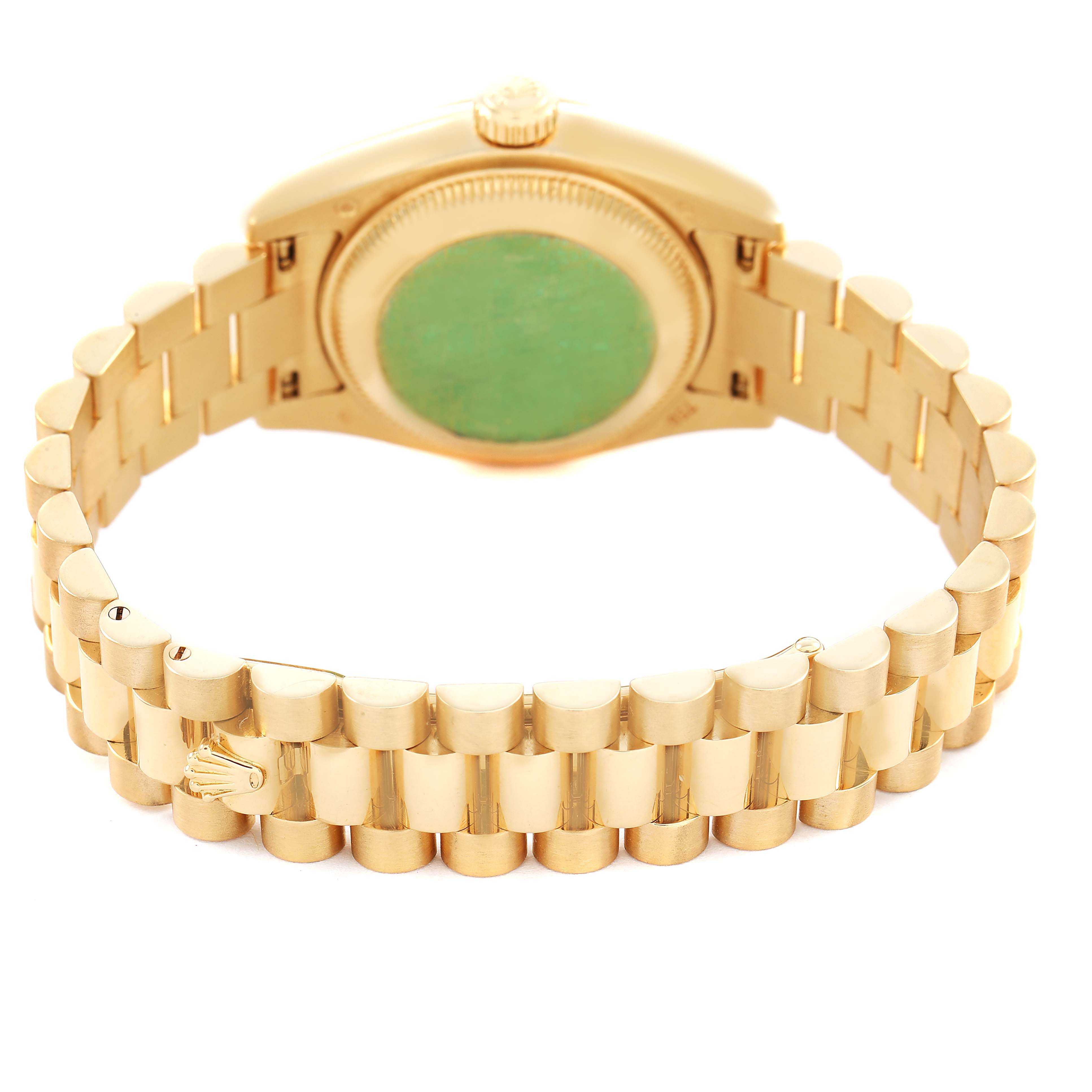 The image shows the backside of a Rolex President 179178 Women's Yellow Gold White Dial model watch with a focus on the case, crown, and bracelet.