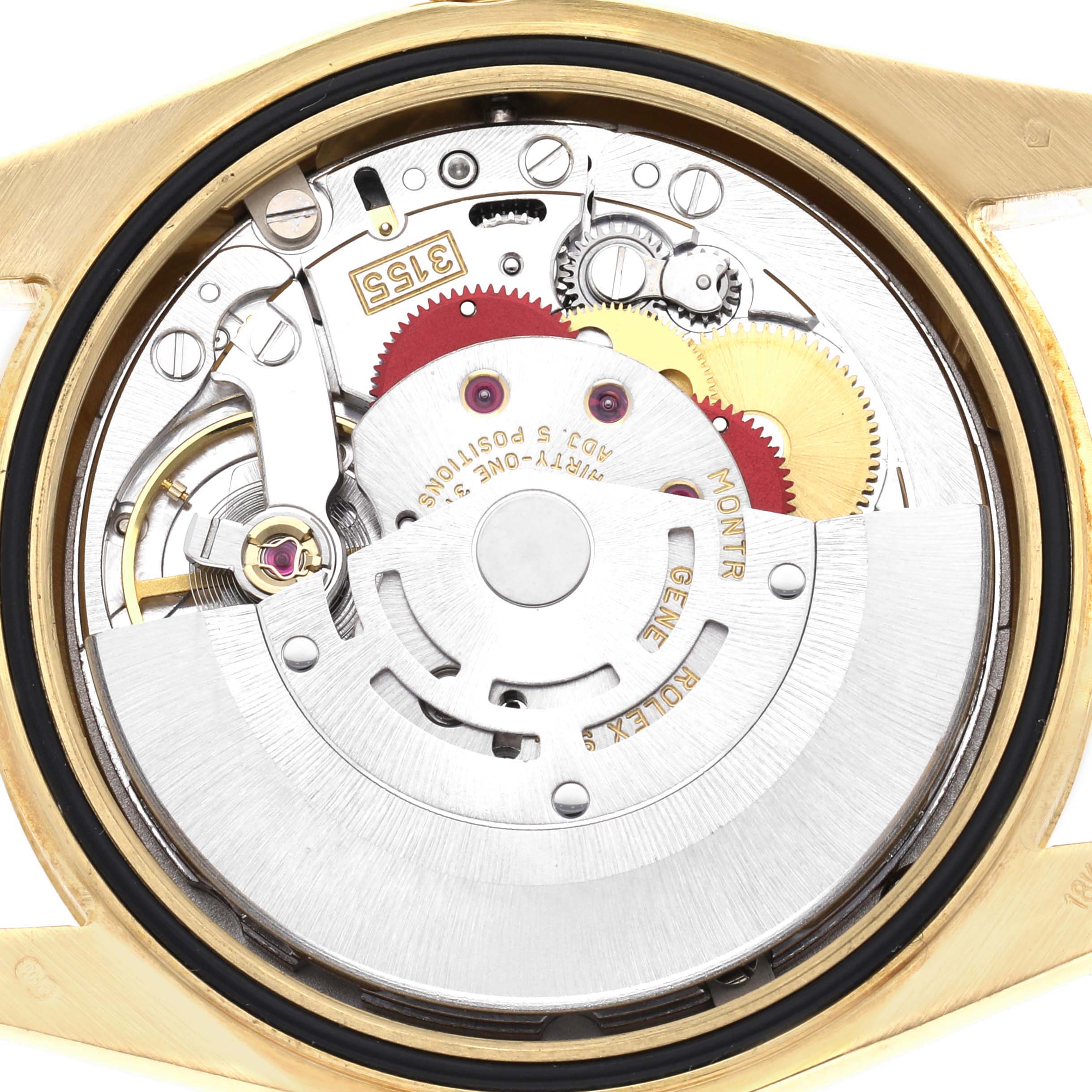The image shows the movement of a Rolex President 118238 Men's Yellow Gold Champagne Dial 118238 Men's Yellow Gold Champagne Dial watch with visible gears, balance wheel, and rotor from the back.
