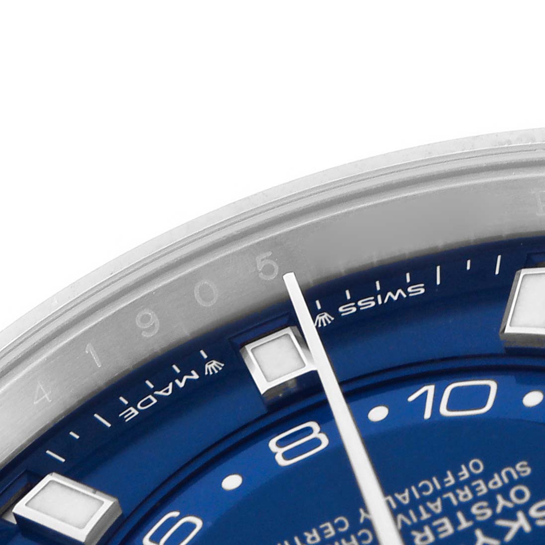 The image shows a close-up of the Rolex Sky-Dweller 336934 Men's Stainless Steel Blue Dial 336934 Men's Stainless Steel Blue Dial watch dial, displaying the hour markers and hands at an angle.