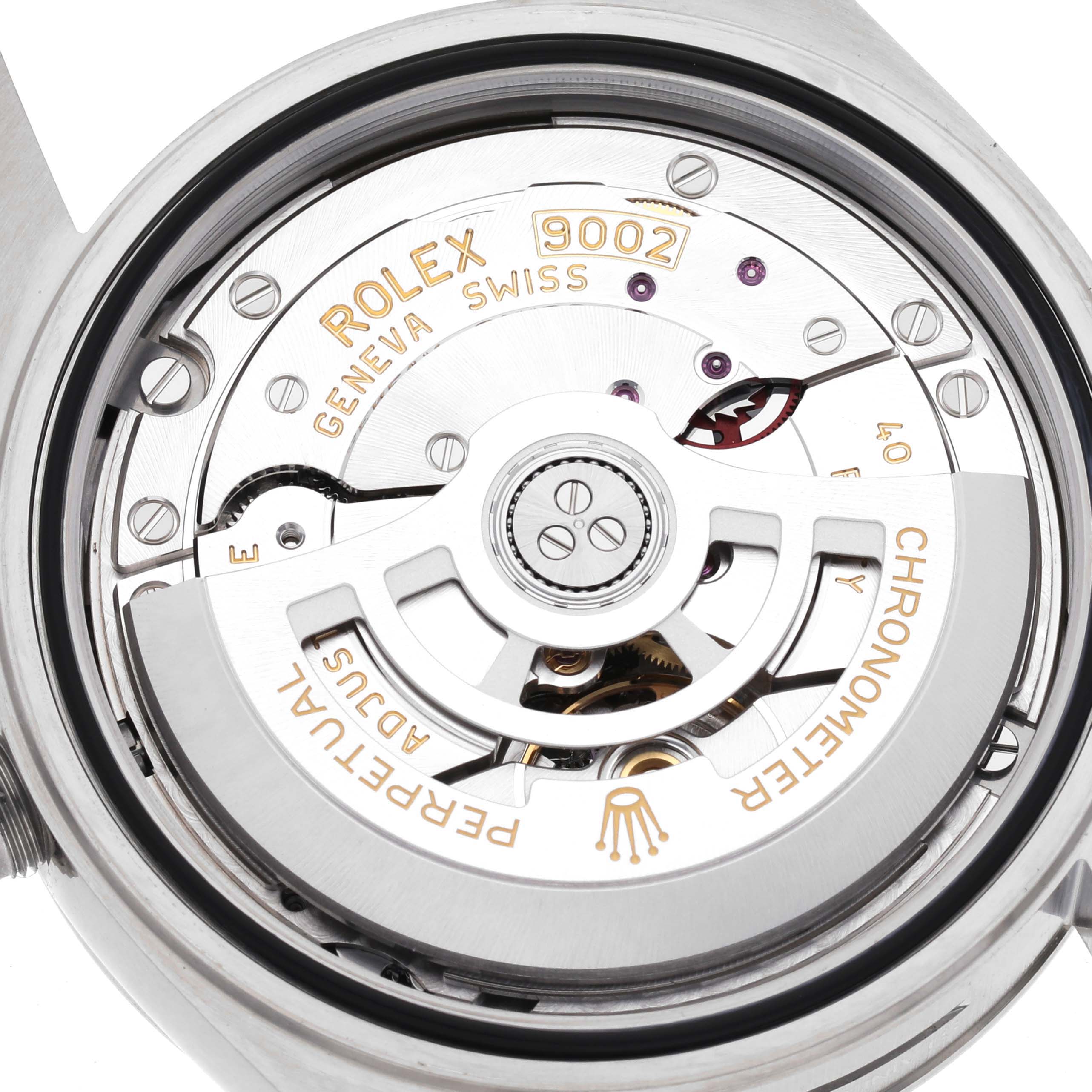 The image shows the back view of a Rolex Sky-Dweller 336934 Men's Stainless Steel Blue Dial 336934 Men's Stainless Steel Blue Dial, revealing its intricate movement and rotor.