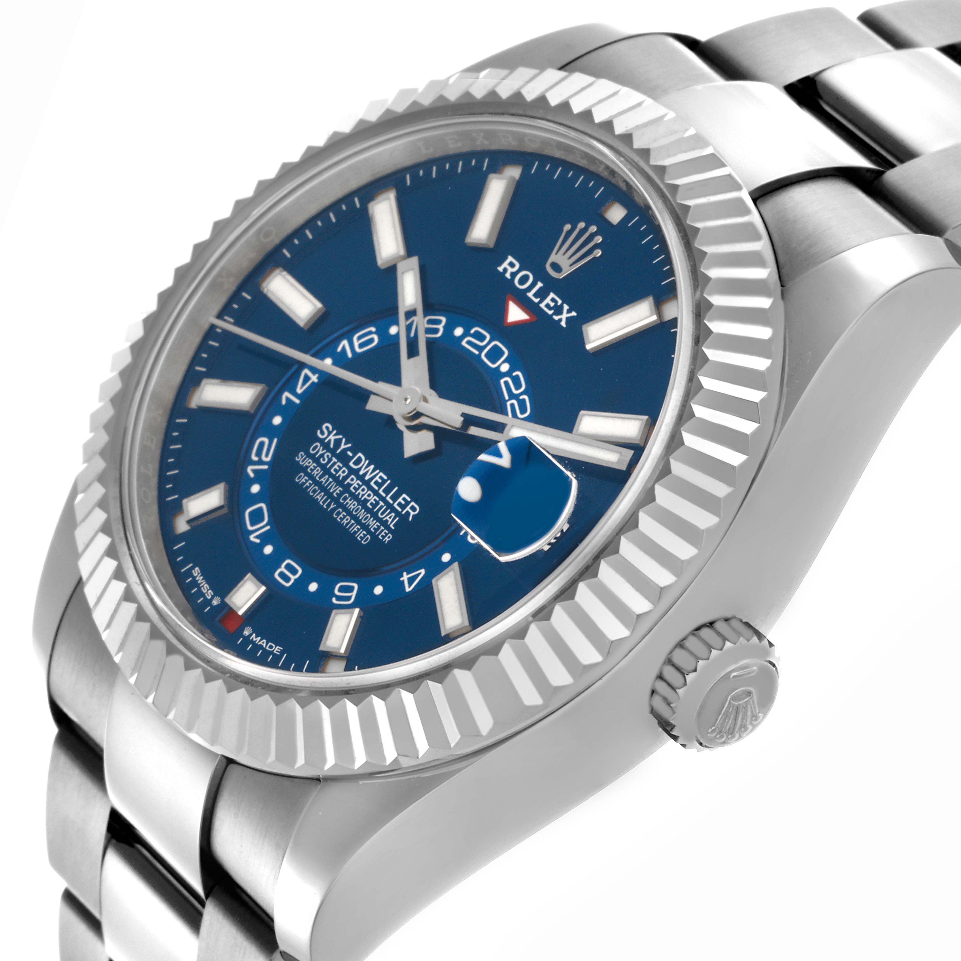 The Rolex Sky-Dweller 336934 Men's Stainless Steel Blue Dial 336934 Men's Stainless Steel Blue Dial watch is shown from a side angle, highlighting the blue dial, fluted bezel, and the bracelet.