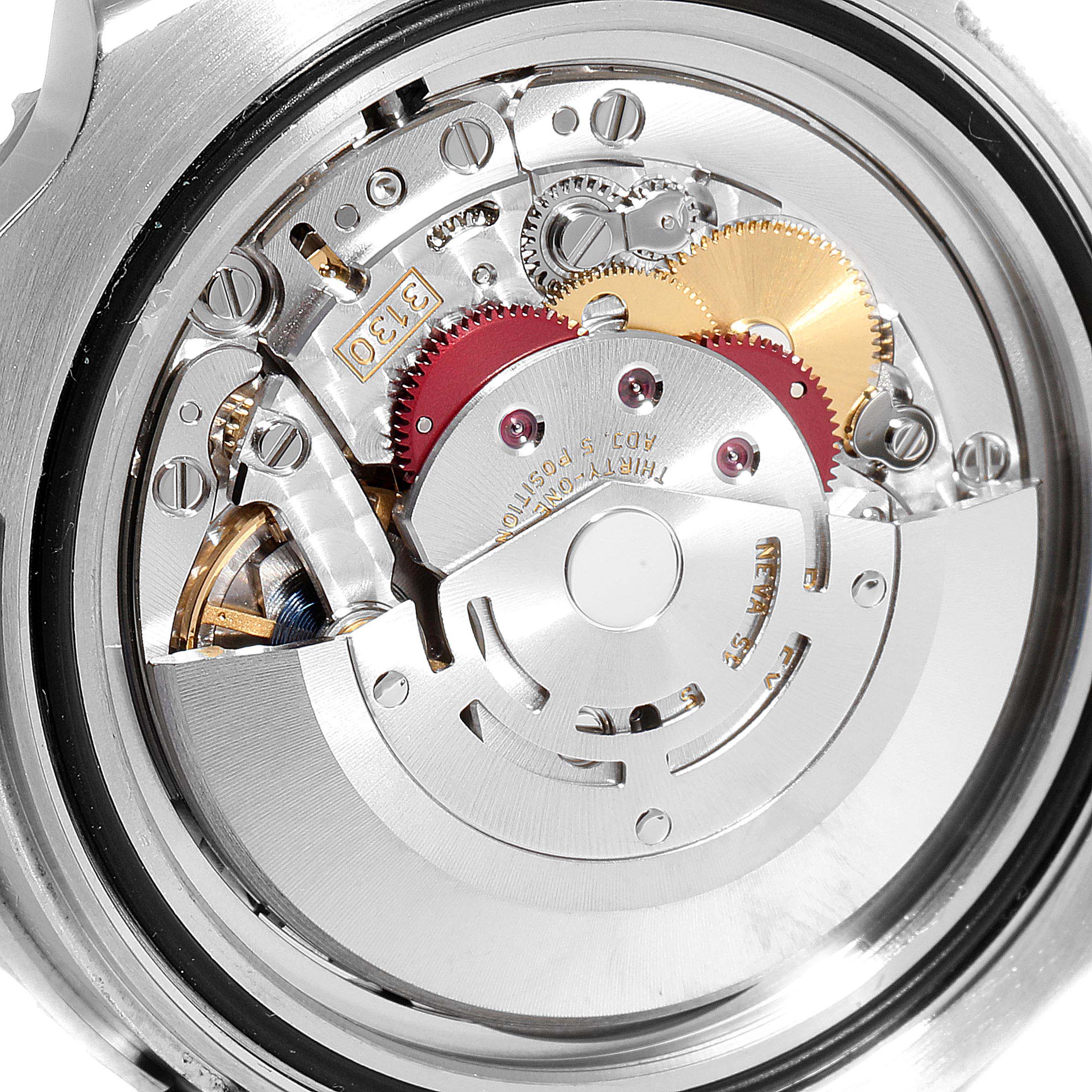 This image shows the intricate internal mechanism of the Rolex Submariner 114060 Men
s Stainless Steel Black Dial 114060 Men
s Stainless Steel Black Dial watch, focusing on its movement components.