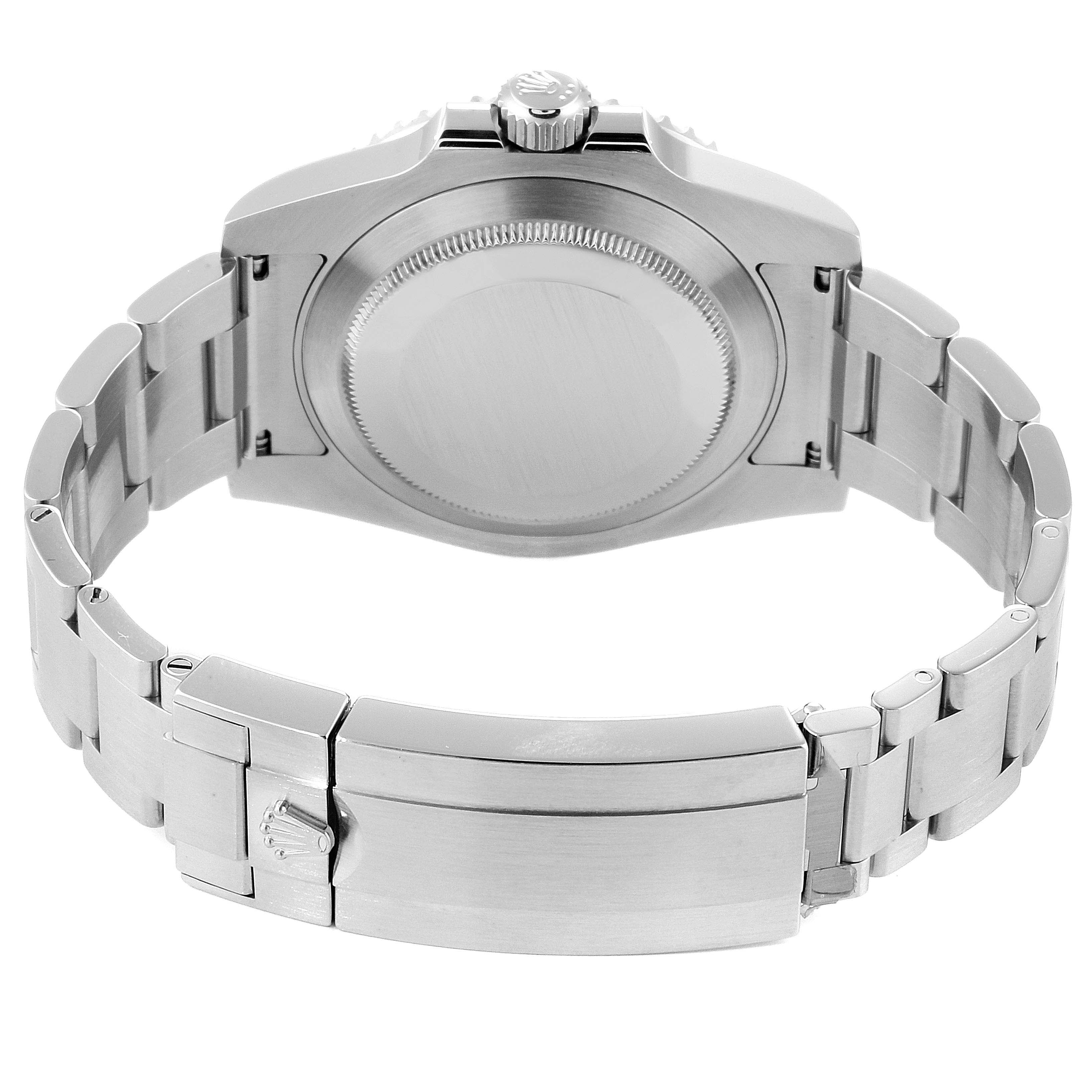 The image shows the back view of a Rolex Submariner 114060 Men
s Stainless Steel Black Dial 114060 Men
s Stainless Steel Black Dial, highlighting its case back, crown, and bracelet with clasp.