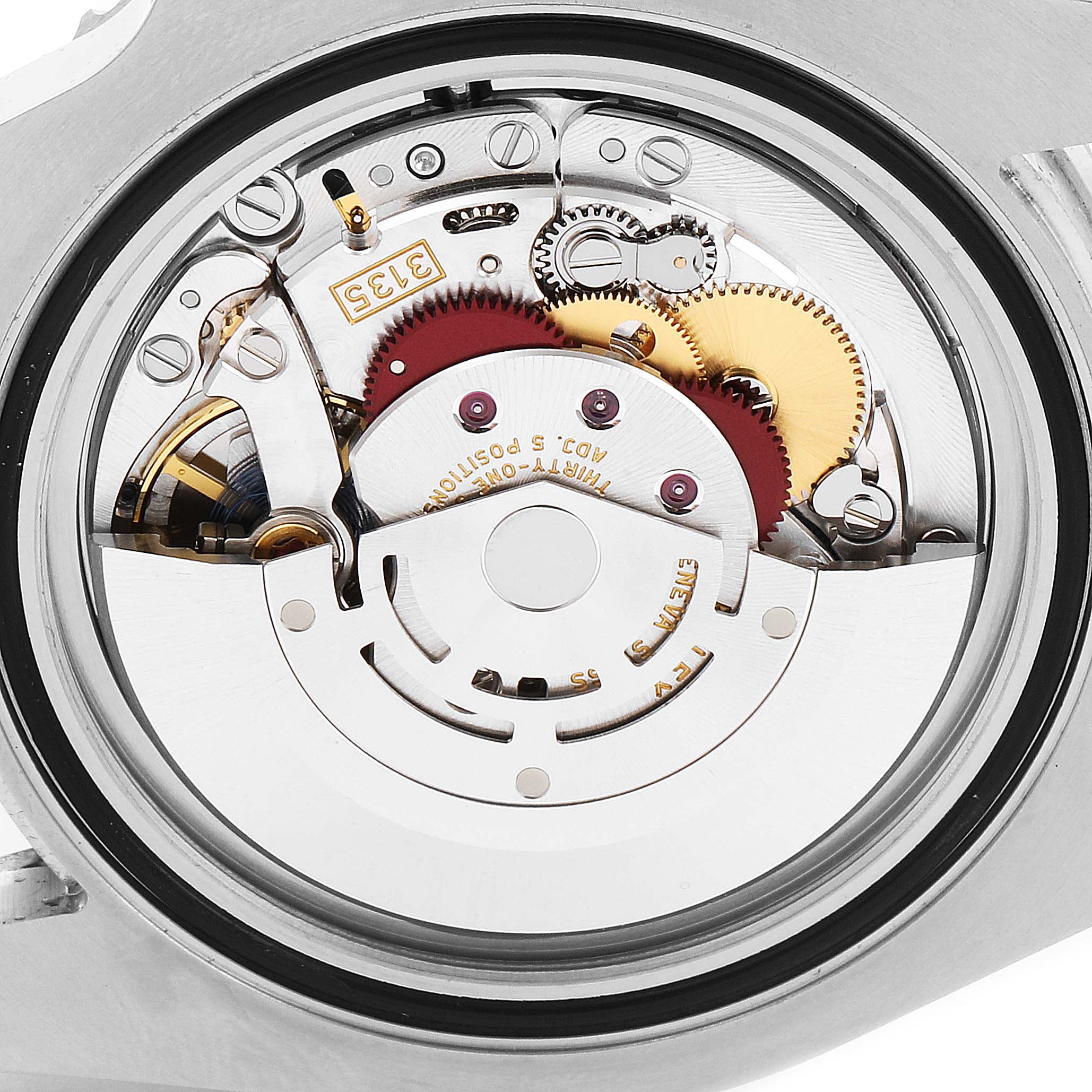The image shows a close-up view of the movement mechanism inside a Rolex Submariner 116610LV Men
s Stainless Steel Green Dial 116610LV Men
s Stainless Steel Green Dial watch.