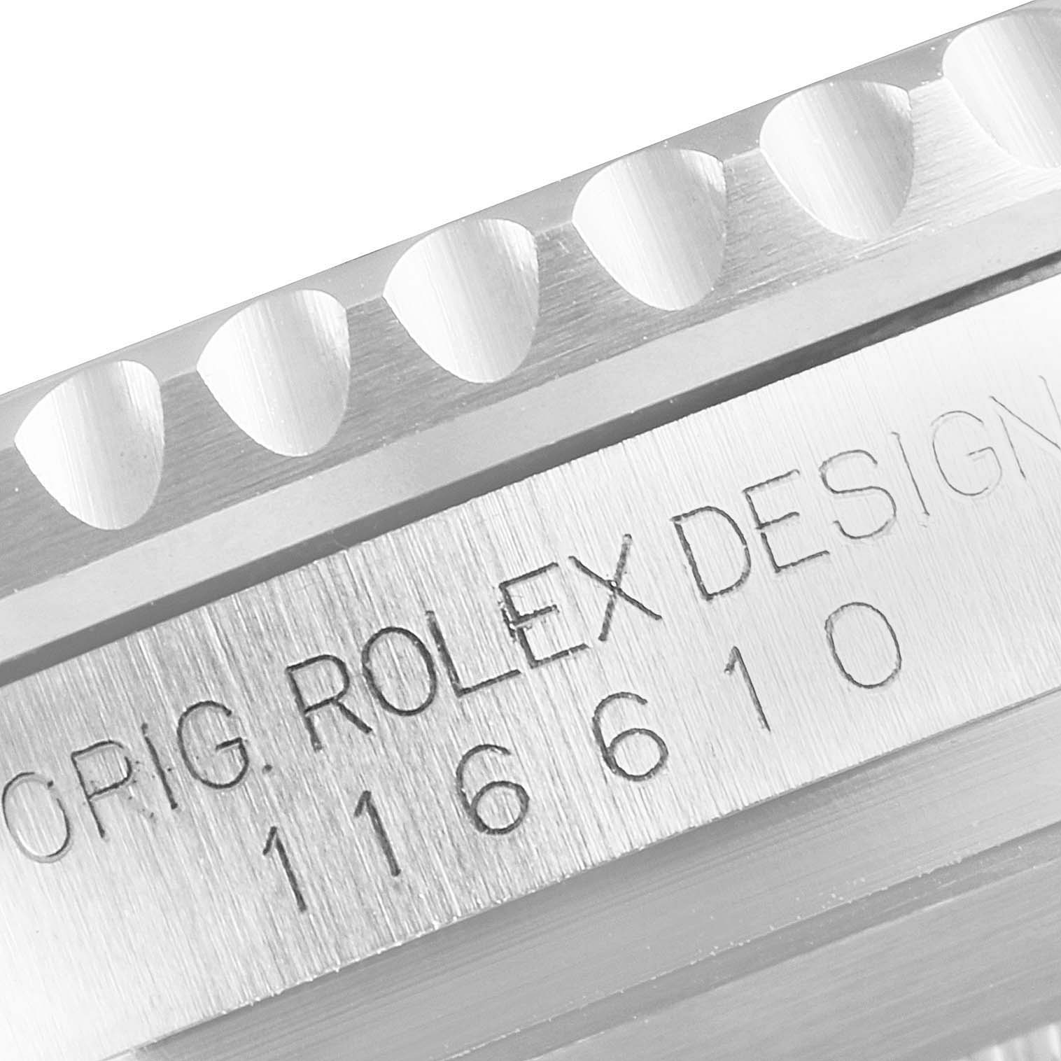 The image shows a close-up of the edge of the bezel and case of a Rolex Submariner 116610LV Men
s Stainless Steel Green Dial 116610LV Men
s Stainless Steel Green Dial model 116610.