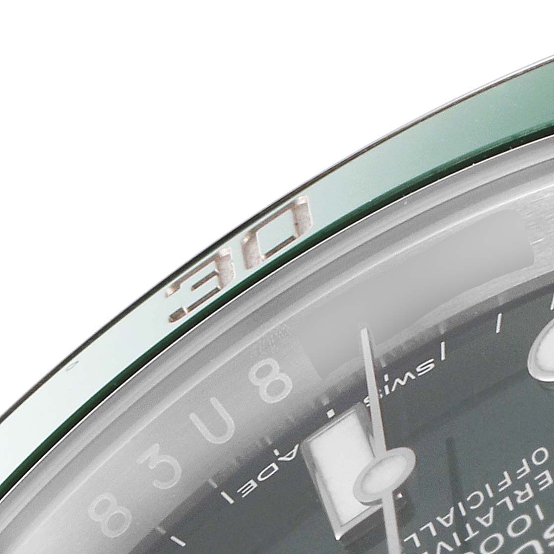 This close-up shows a partial view of the dial and bezel of the Rolex Submariner 116610LV Men
s Stainless Steel Green Dial 116610LV Men
s Stainless Steel Green Dial watch.