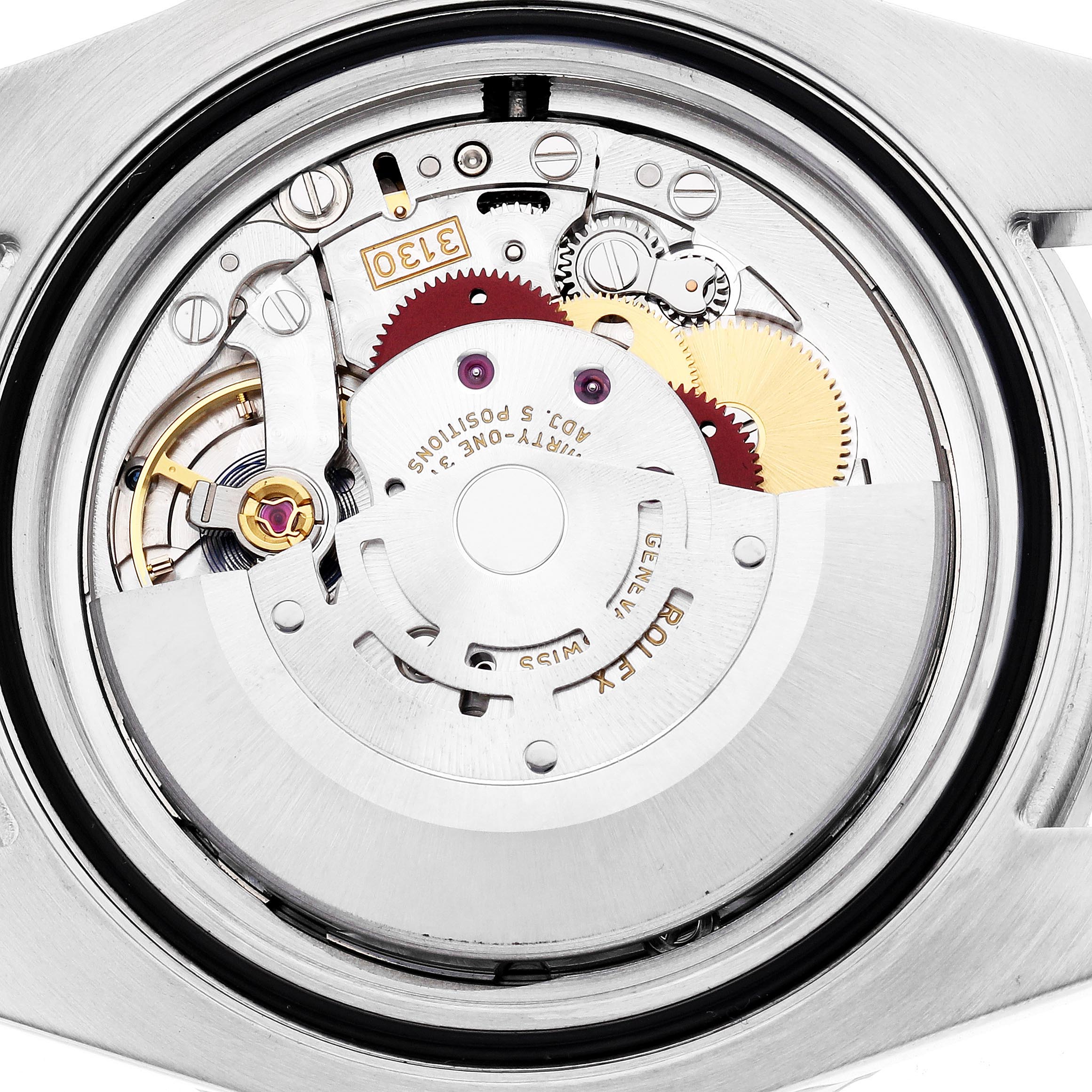 The image shows the internal mechanism of a Rolex Submariner 114060 Men's Stainless Steel Black Dial 114060 Men's Stainless Steel Black Dial watch with gears and parts exposed from a top-down angle.