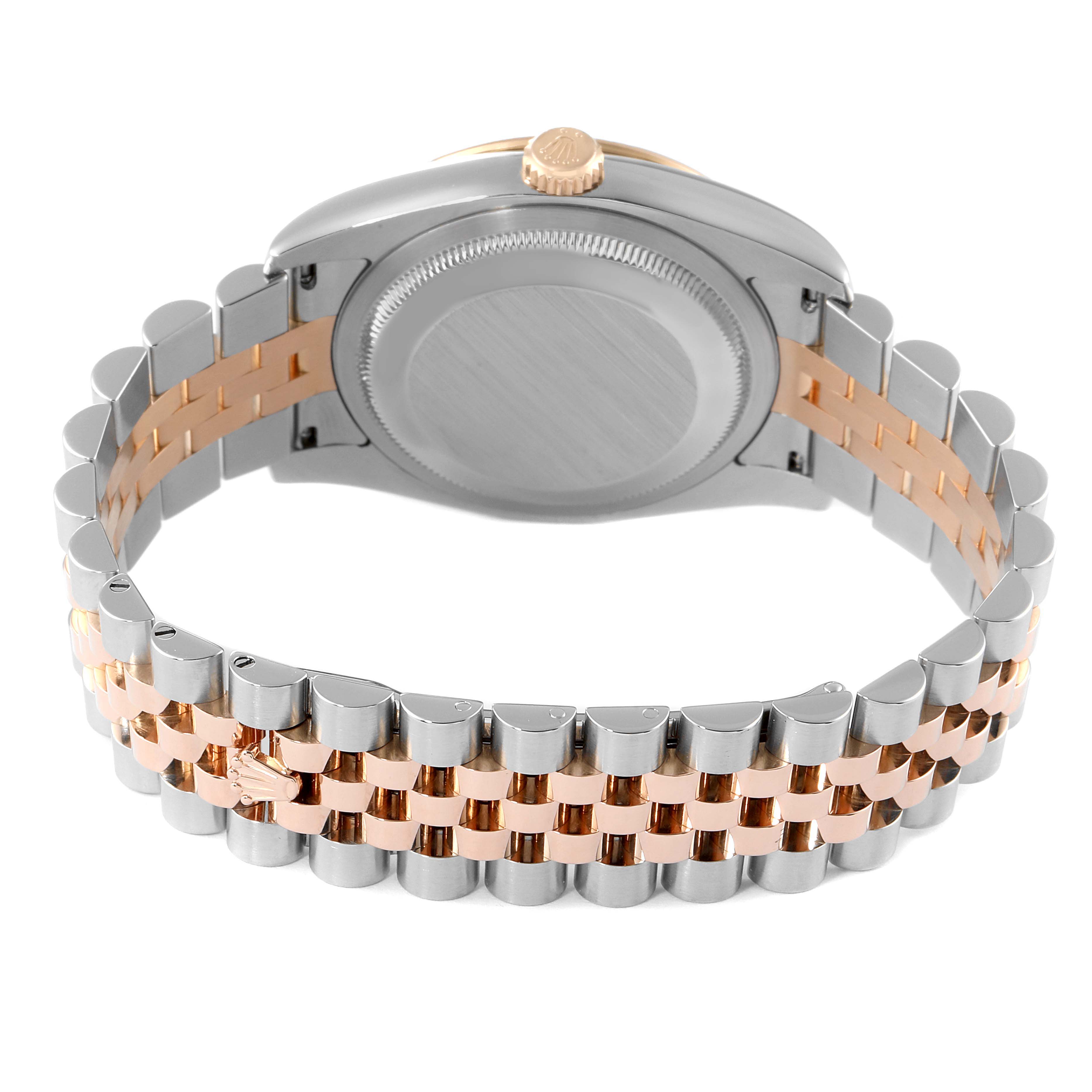 The image shows the back view of a Rolex Turn-o-Graph 116261 Men
s Steel and Gold (two tone) Black Dial 116261 Men
s Steel and Gold (two tone) Black Dial watch, highlighting its two-tone bracelet and case.