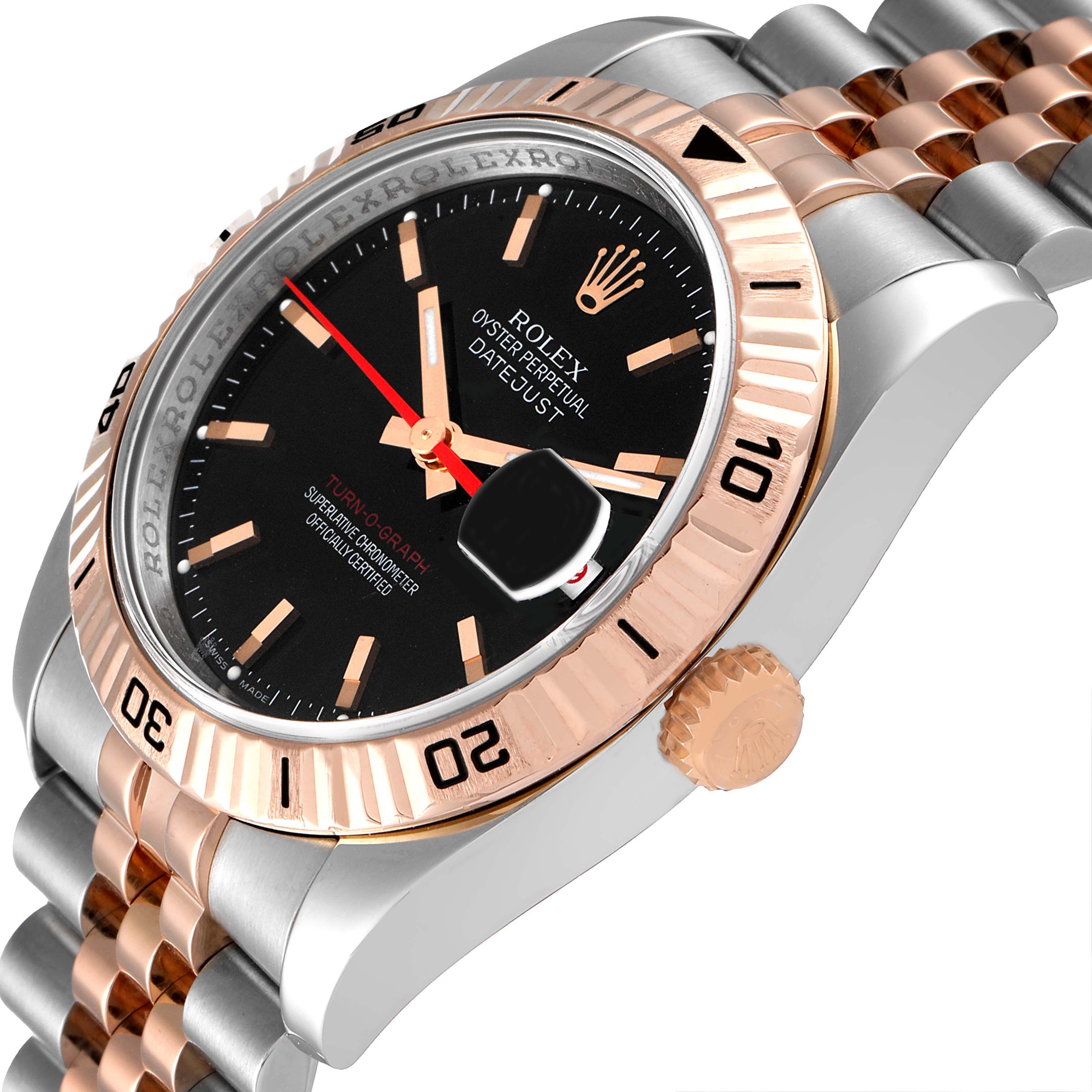 The image shows a close-up angle of the Rolex Turn-o-Graph 116261 Men
s Steel and Gold (two tone) Black Dial 116261 Men
s Steel and Gold (two tone) Black Dial watch, highlighting its black dial, bezel, and two-tone metal bracelet.