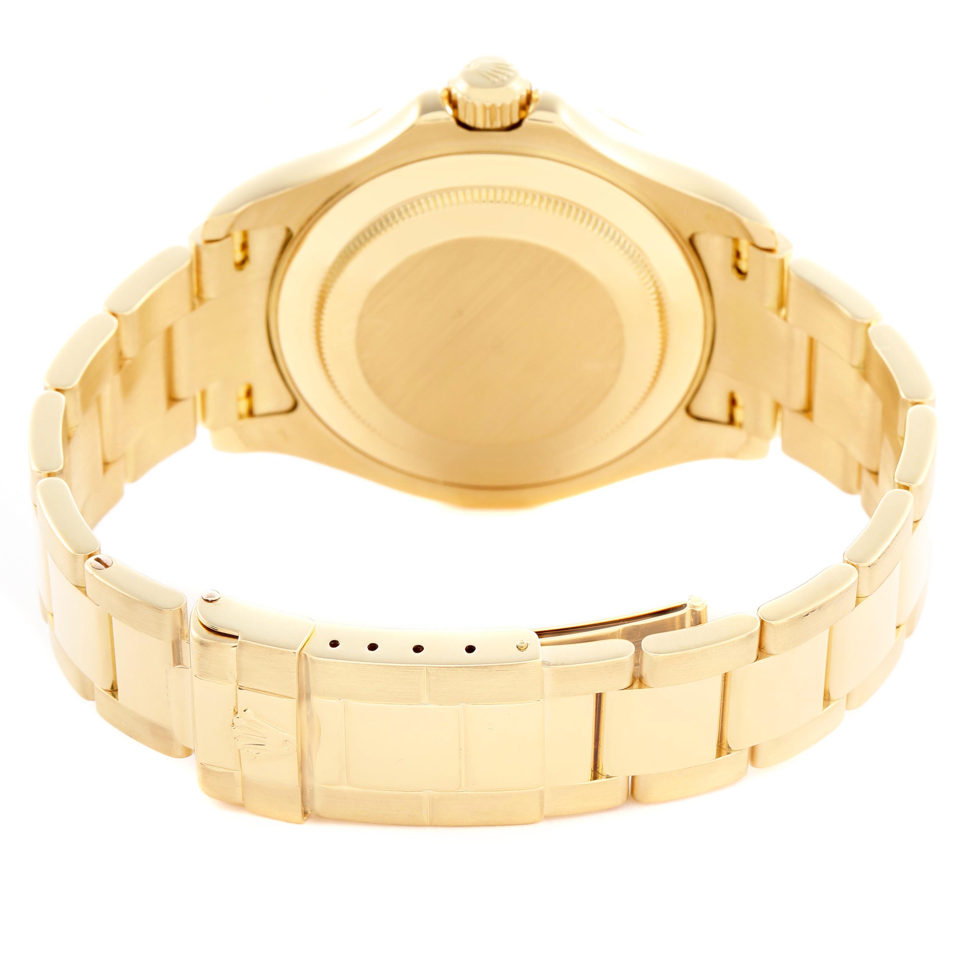 The image shows the back and bracelet of a Rolex Yacht-Master 16628 Men's Yellow Gold Mother of Pearl Dial 16628 Men's Yellow Gold Mother of Pearl Dial watch at a rear angle, highlighting the gold links and clasp.